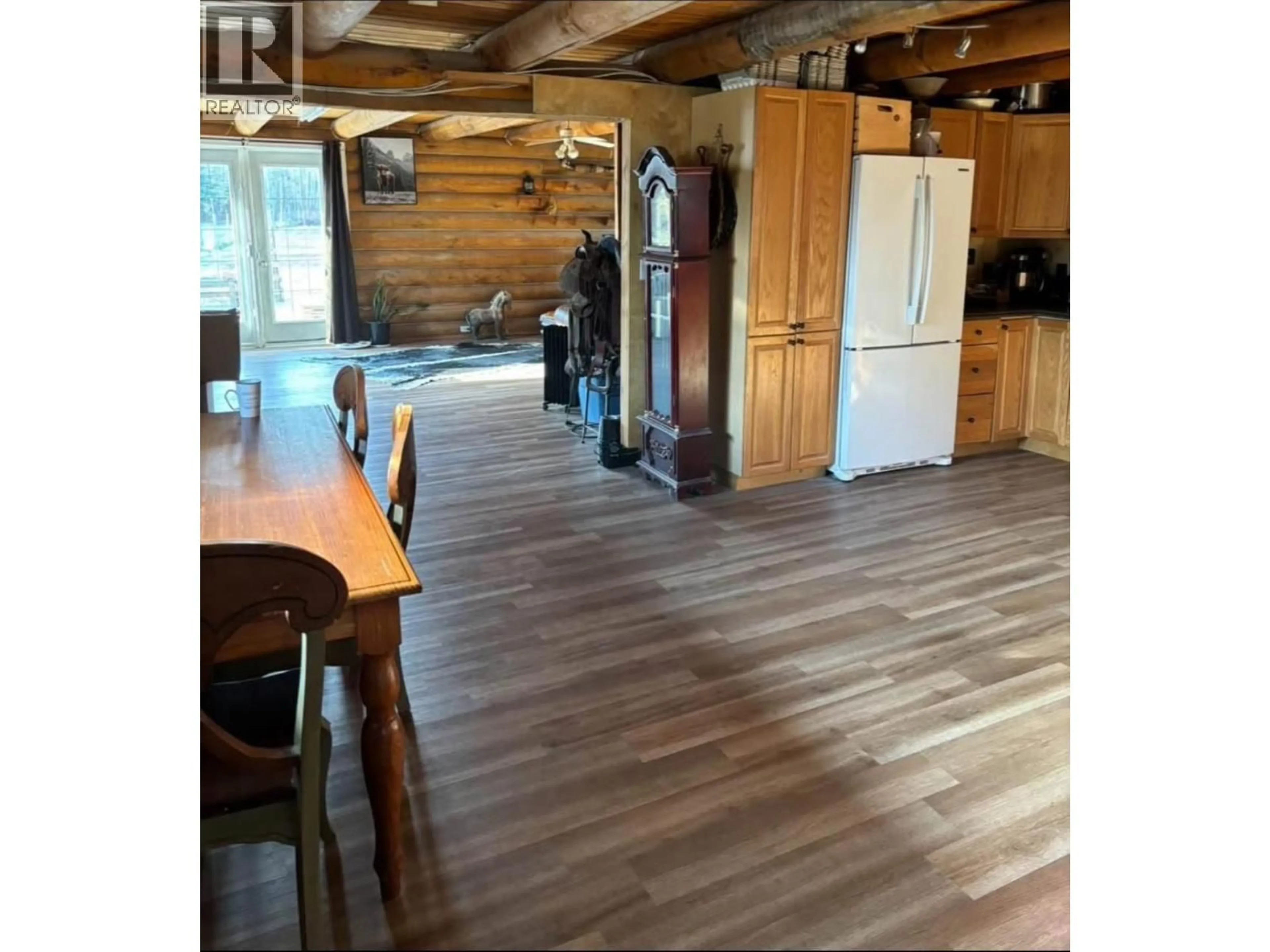 Open concept kitchen, wood/laminate floor for 4312 245 ROAD, Dawson Creek British Columbia V0C1N0
