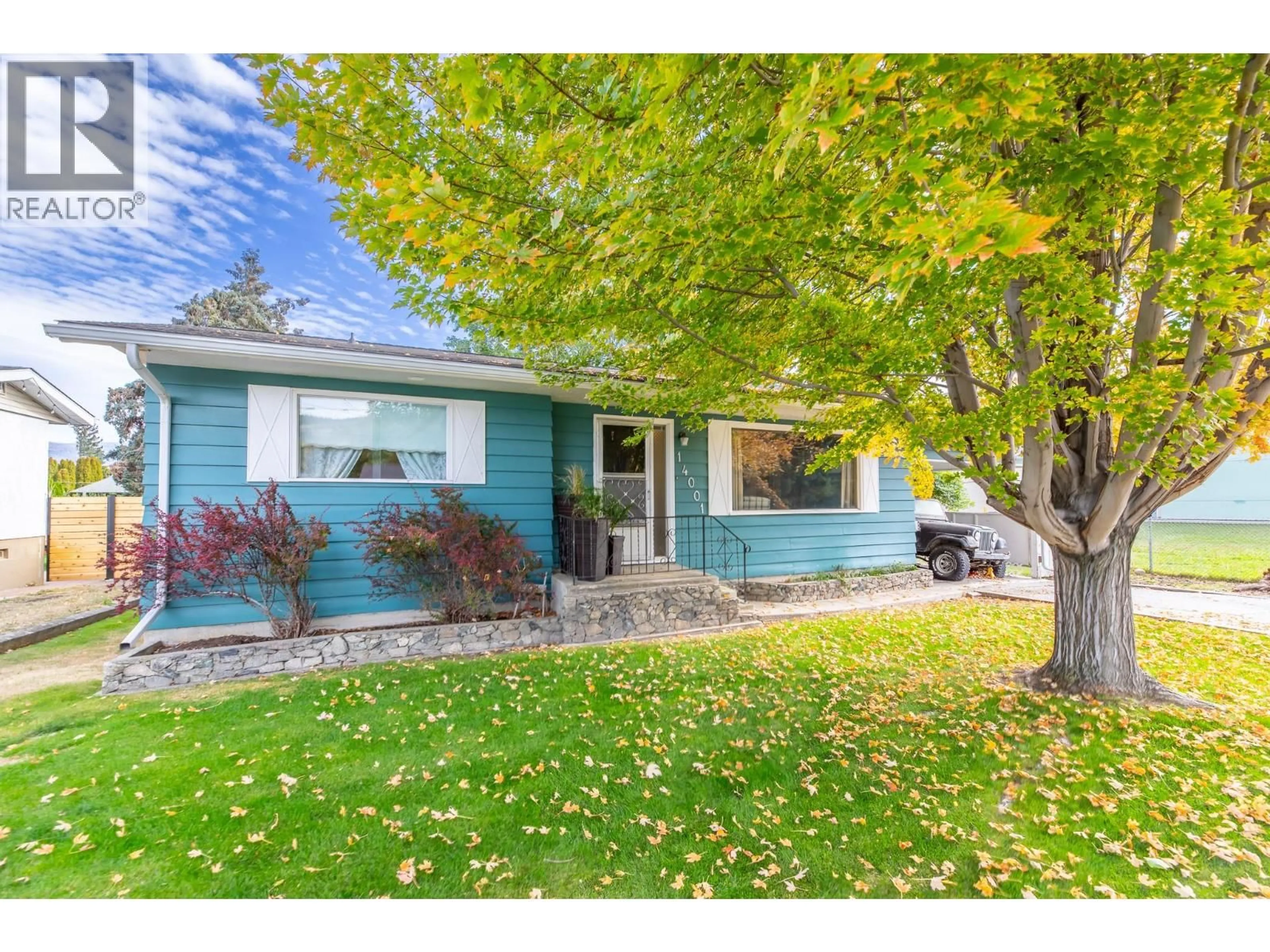 Home with vinyl exterior material, street for 14001 AMM AVENUE, Summerland British Columbia V0H1Z0