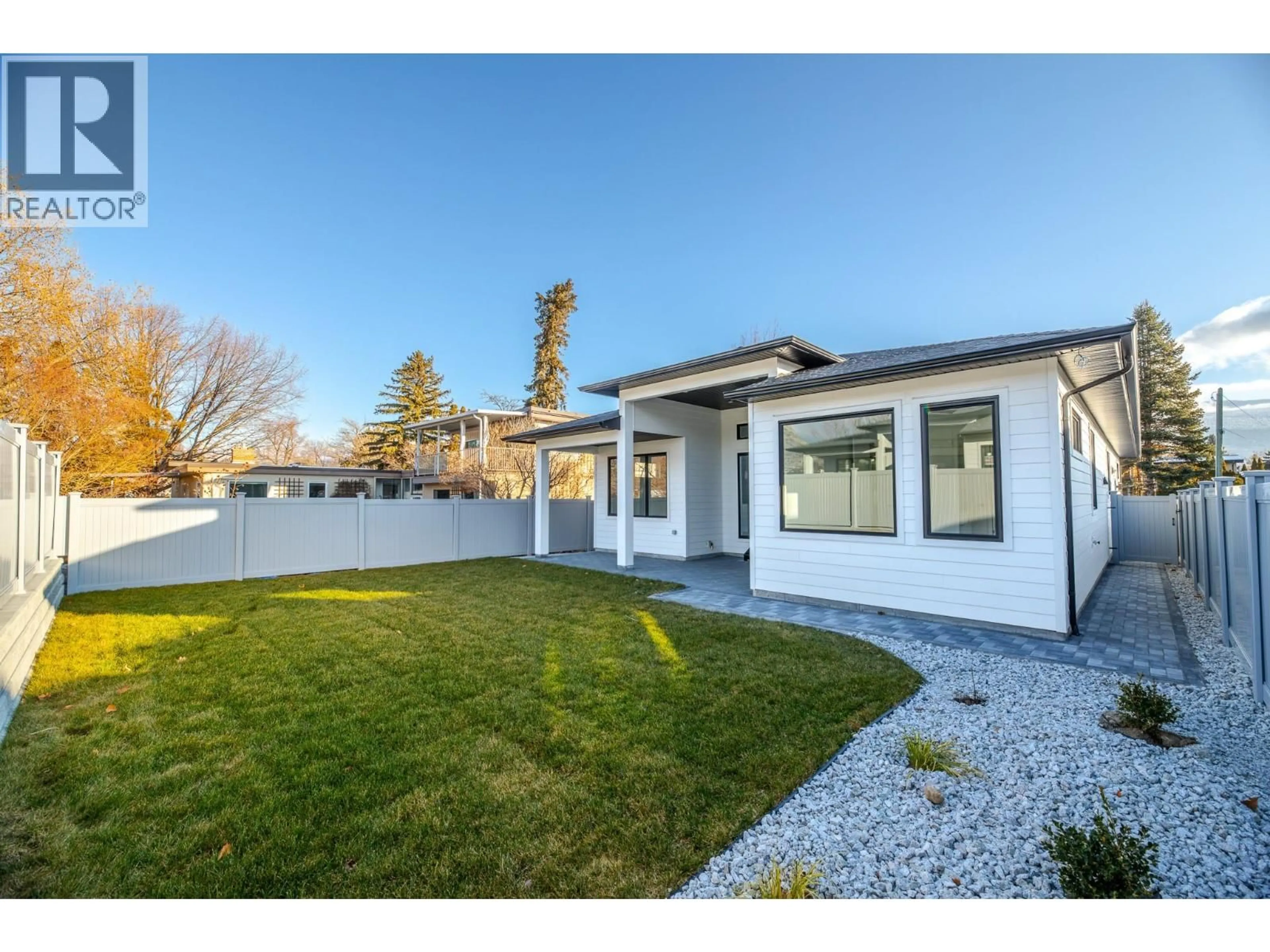 Home with vinyl exterior material, street for 5586 NIXON ROAD, Summerland British Columbia V0H1Z9