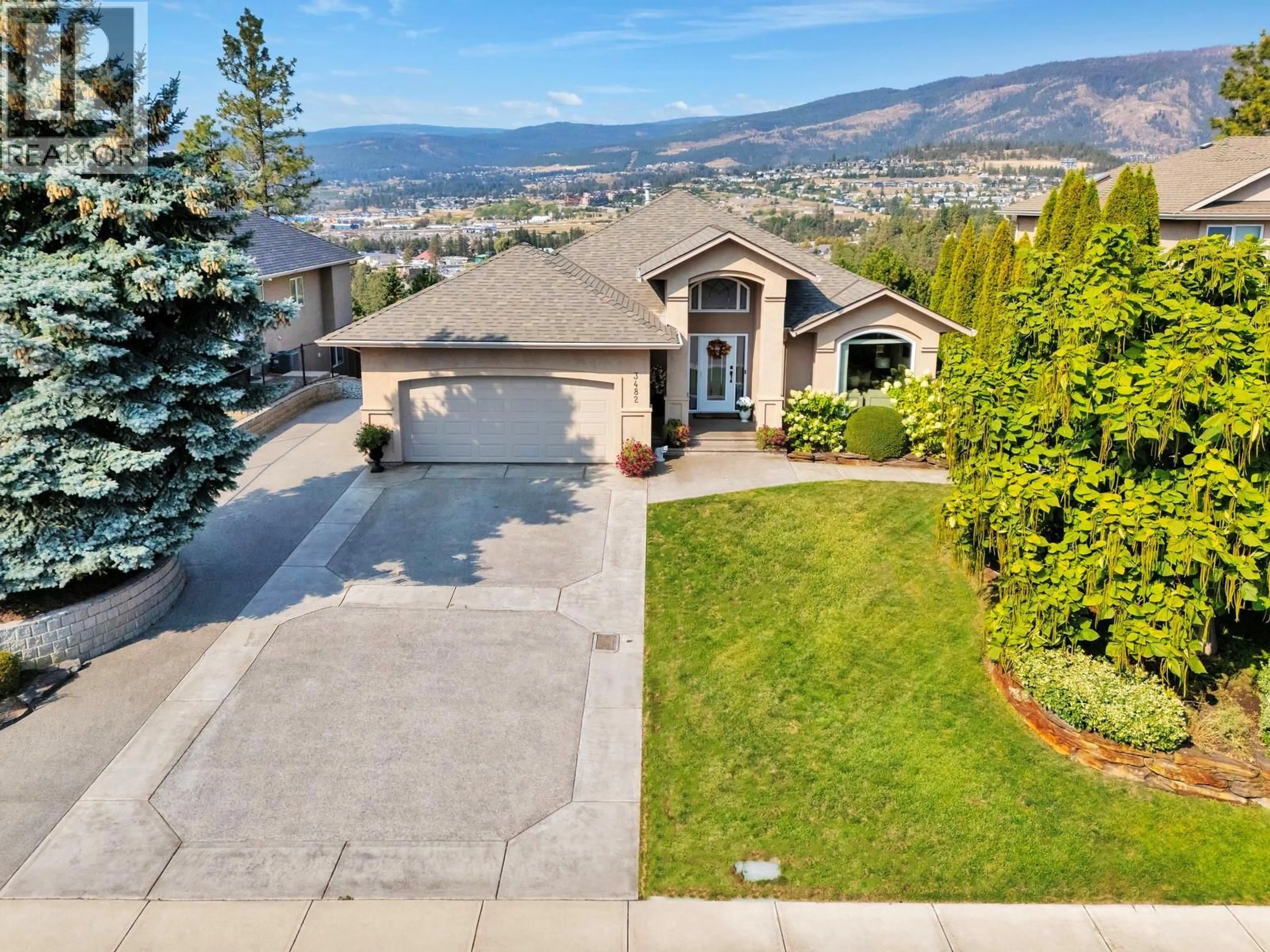 A pic from outside/outdoor area/front of a property/back of a property/a pic from drone, mountain view for 3482 RIDGE BOULEVARD, West Kelowna British Columbia V4T2V5