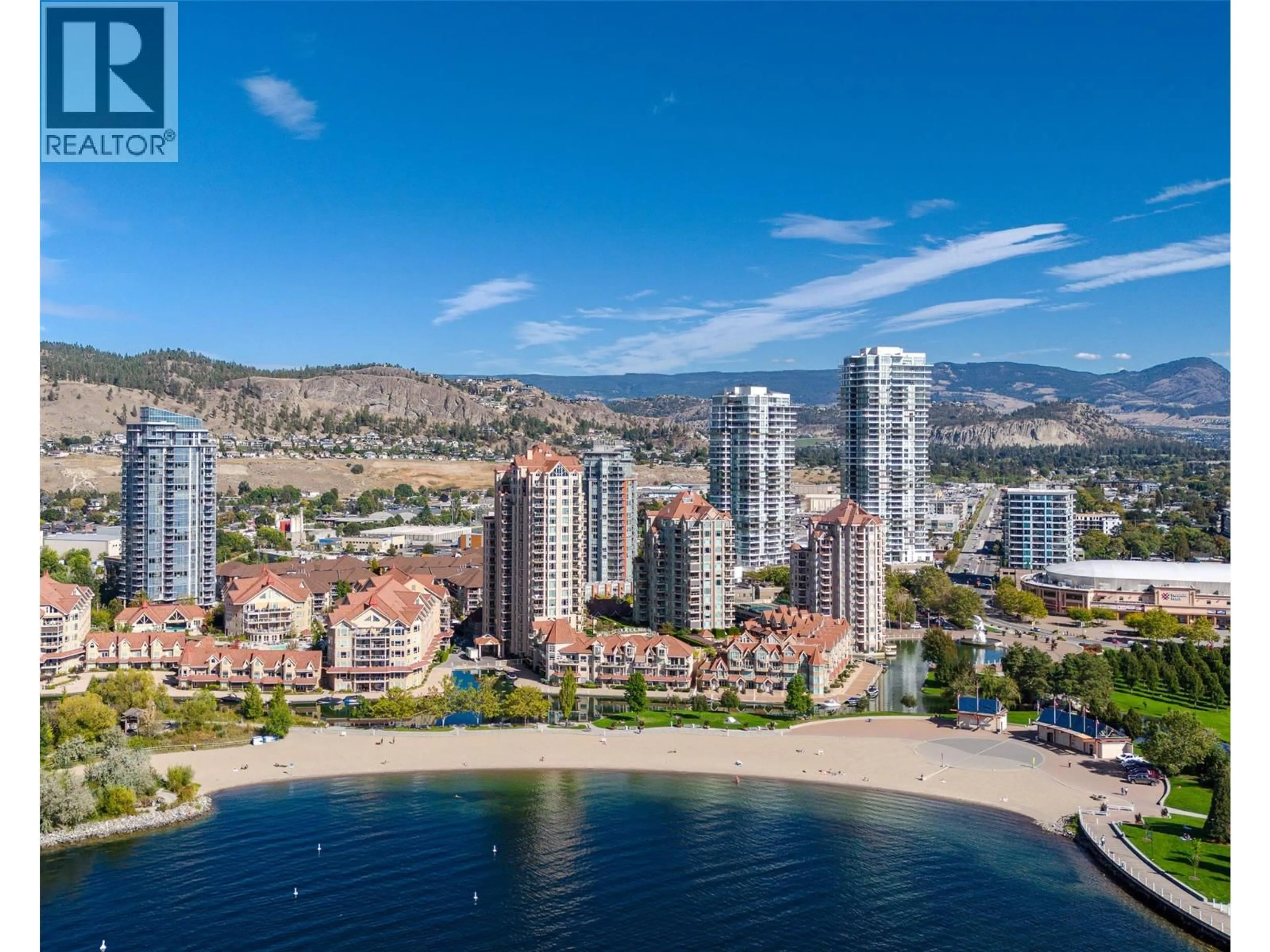 A pic from outside/outdoor area/front of a property/back of a property/a pic from drone, water/lake/river/ocean view for 1404 - 1191 SUNSET DRIVE, Kelowna British Columbia V1Y0J4