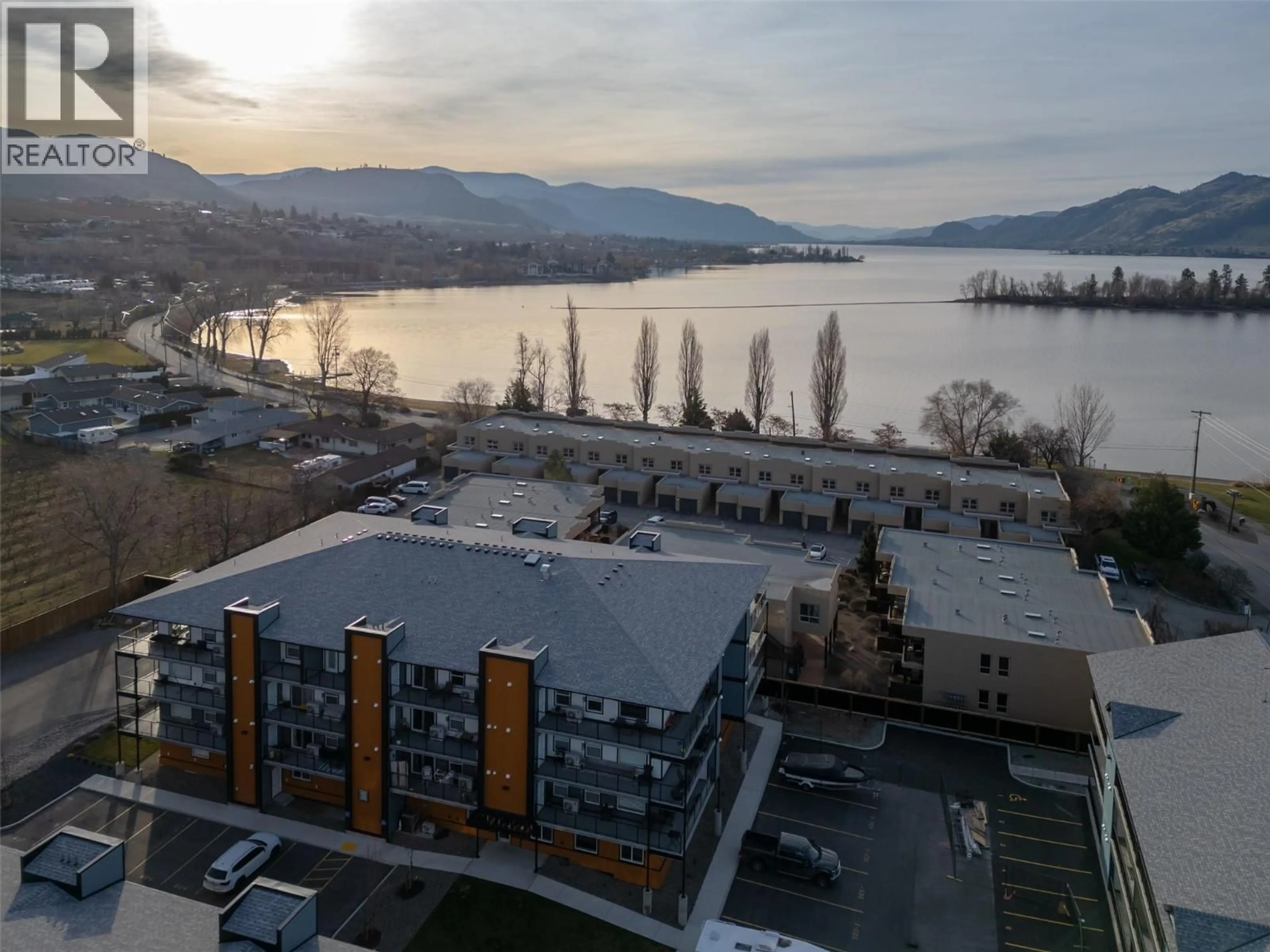 A pic from outside/outdoor area/front of a property/back of a property/a pic from drone, water/lake/river/ocean view for 301 - 5620 51 STREET, Osoyoos British Columbia V0H1V6