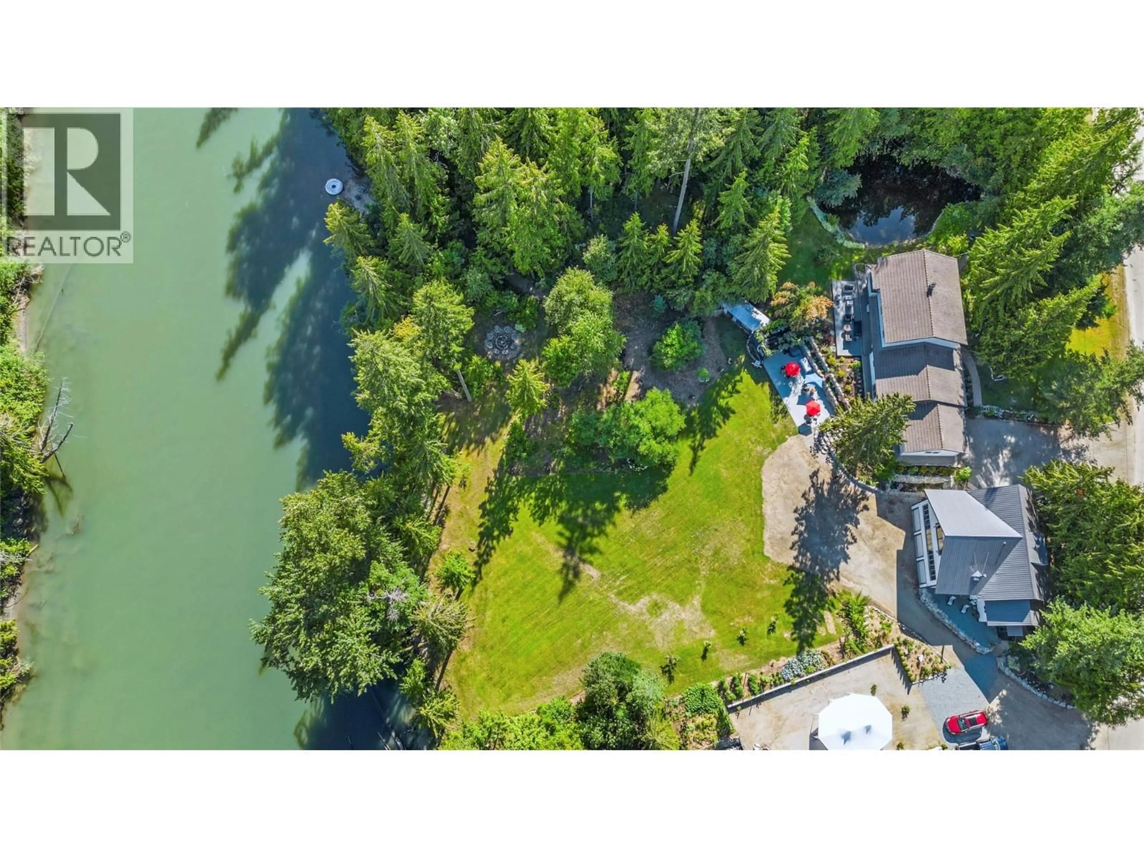 A pic from outside/outdoor area/front of a property/back of a property/a pic from drone, water/lake/river/ocean view for 2012 BUNDUS ROAD, Sicamous British Columbia V0E2V4