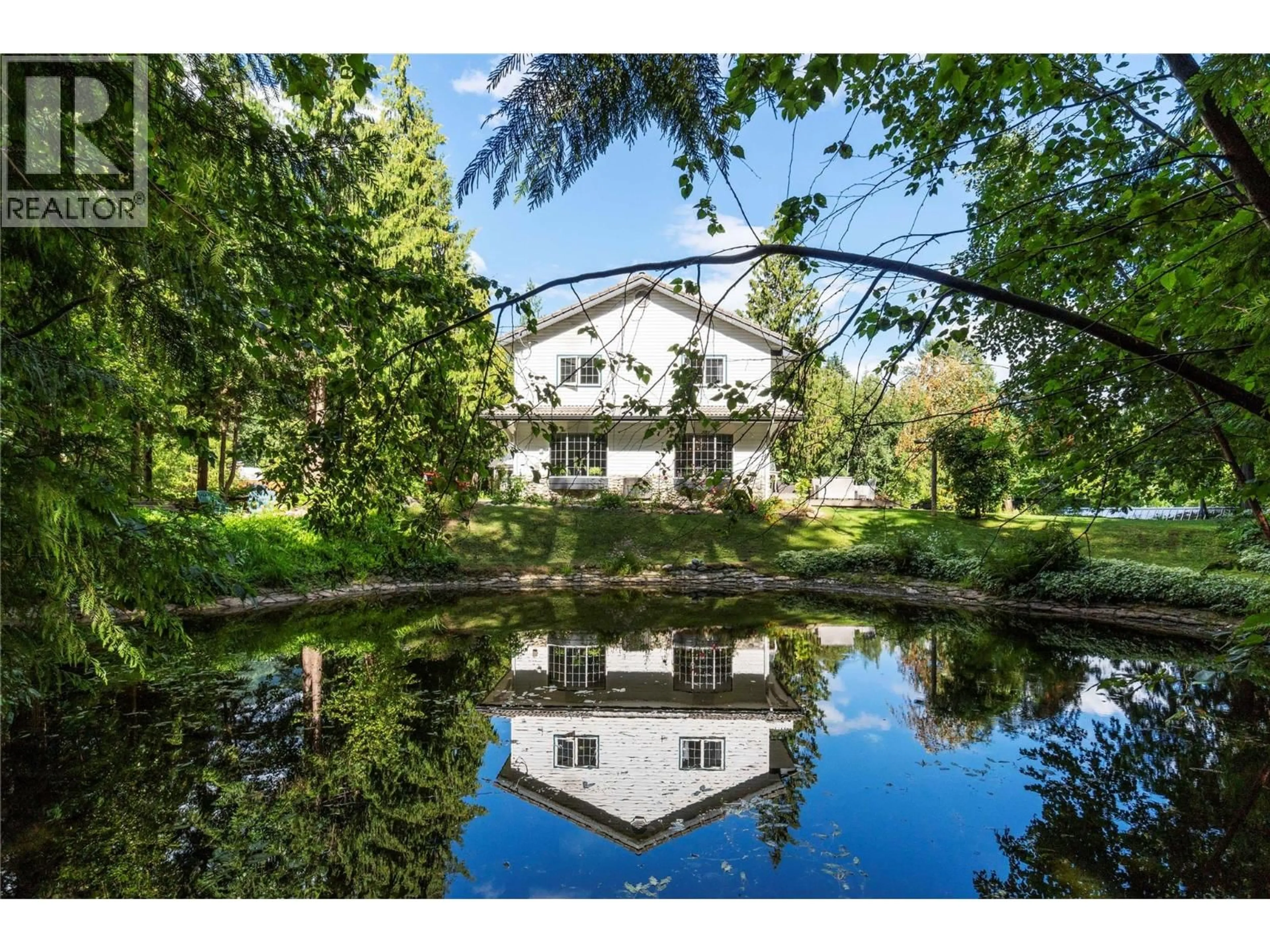 A pic from outside/outdoor area/front of a property/back of a property/a pic from drone, water/lake/river/ocean view for 2012 BUNDUS ROAD, Sicamous British Columbia V0E2V4