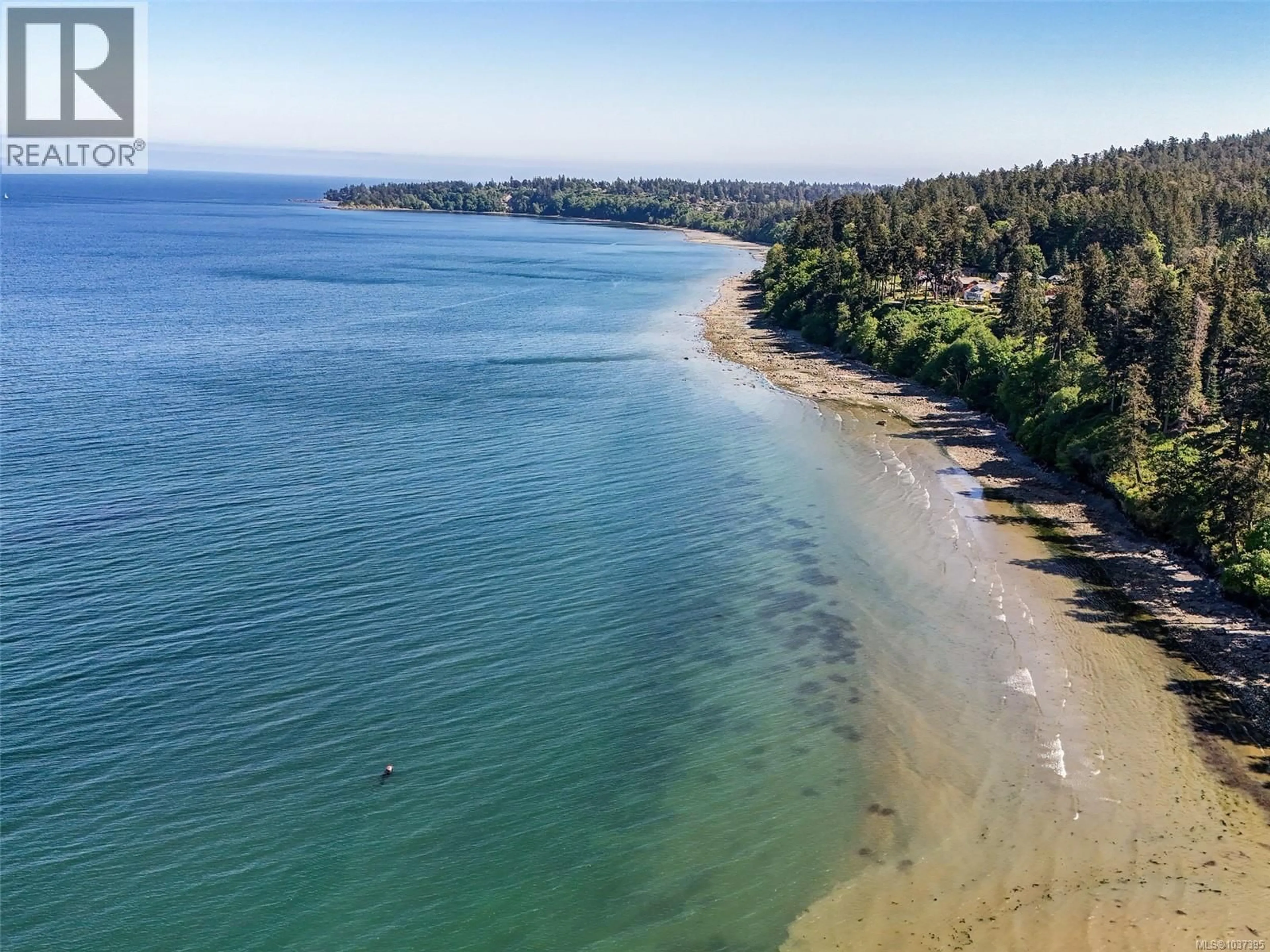 A pic from outside/outdoor area/front of a property/back of a property/a pic from drone, water/lake/river/ocean view for 1 - 4771 CORDOVA BAY ROAD, Saanich British Columbia V8Y2J7