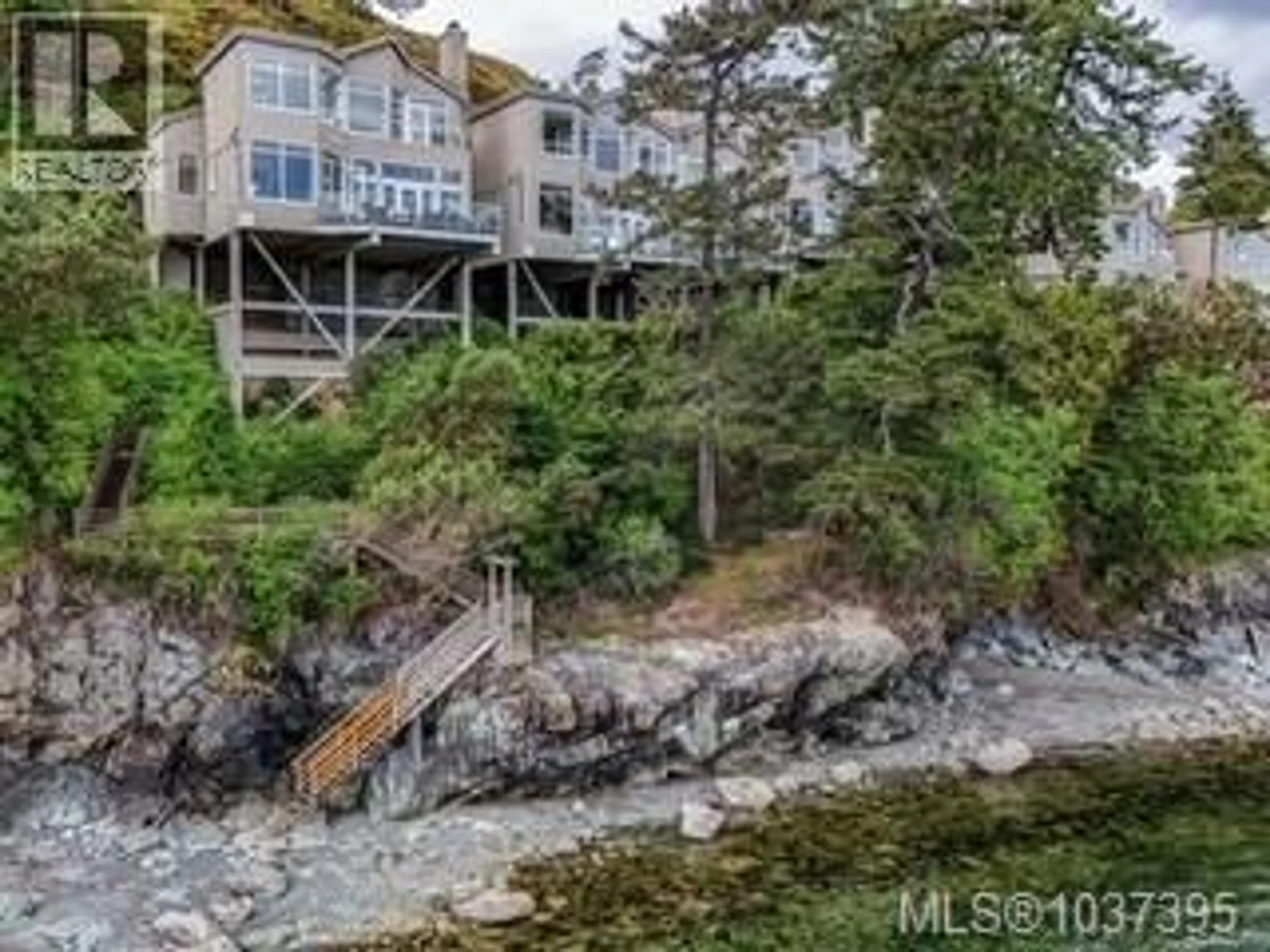 A pic from outside/outdoor area/front of a property/back of a property/a pic from drone, water/lake/river/ocean view for 1 - 4771 CORDOVA BAY ROAD, Saanich British Columbia V8Y2J7
