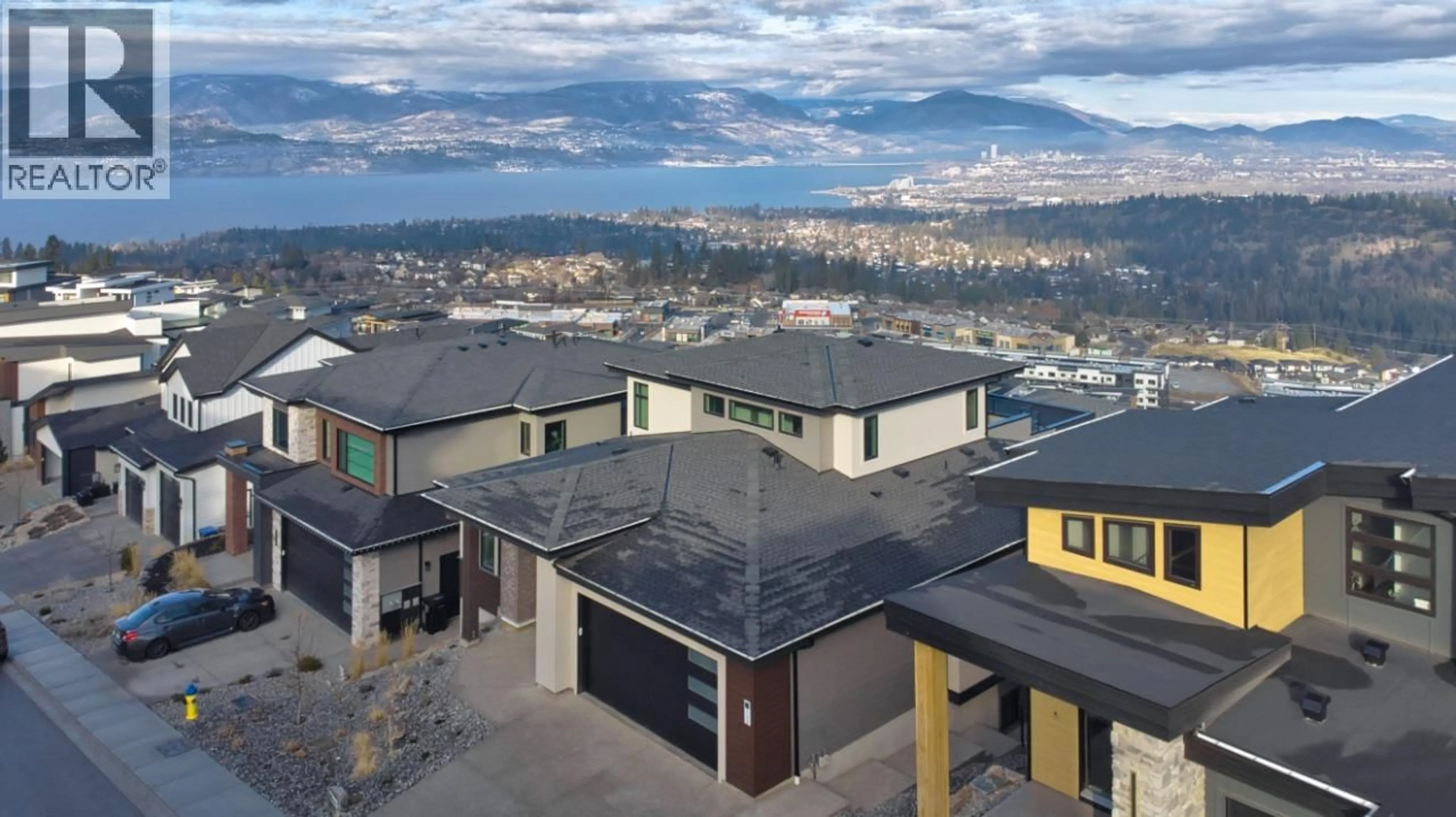 A pic from outside/outdoor area/front of a property/back of a property/a pic from drone, mountain view for 1030 EMSLIE STREET, Kelowna British Columbia V1W0C3