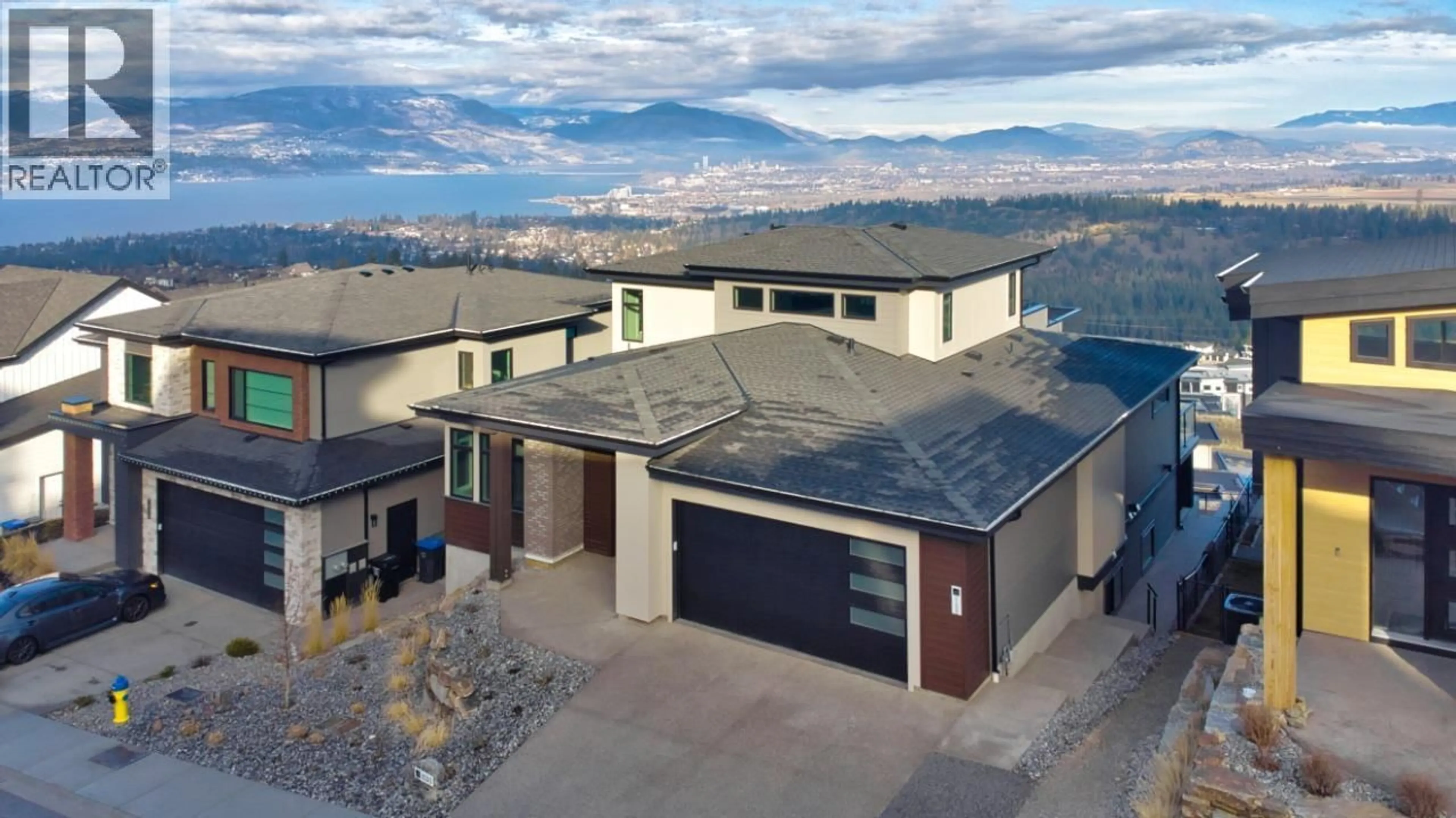 A pic from outside/outdoor area/front of a property/back of a property/a pic from drone, mountain view for 1030 EMSLIE STREET, Kelowna British Columbia V1W0C3