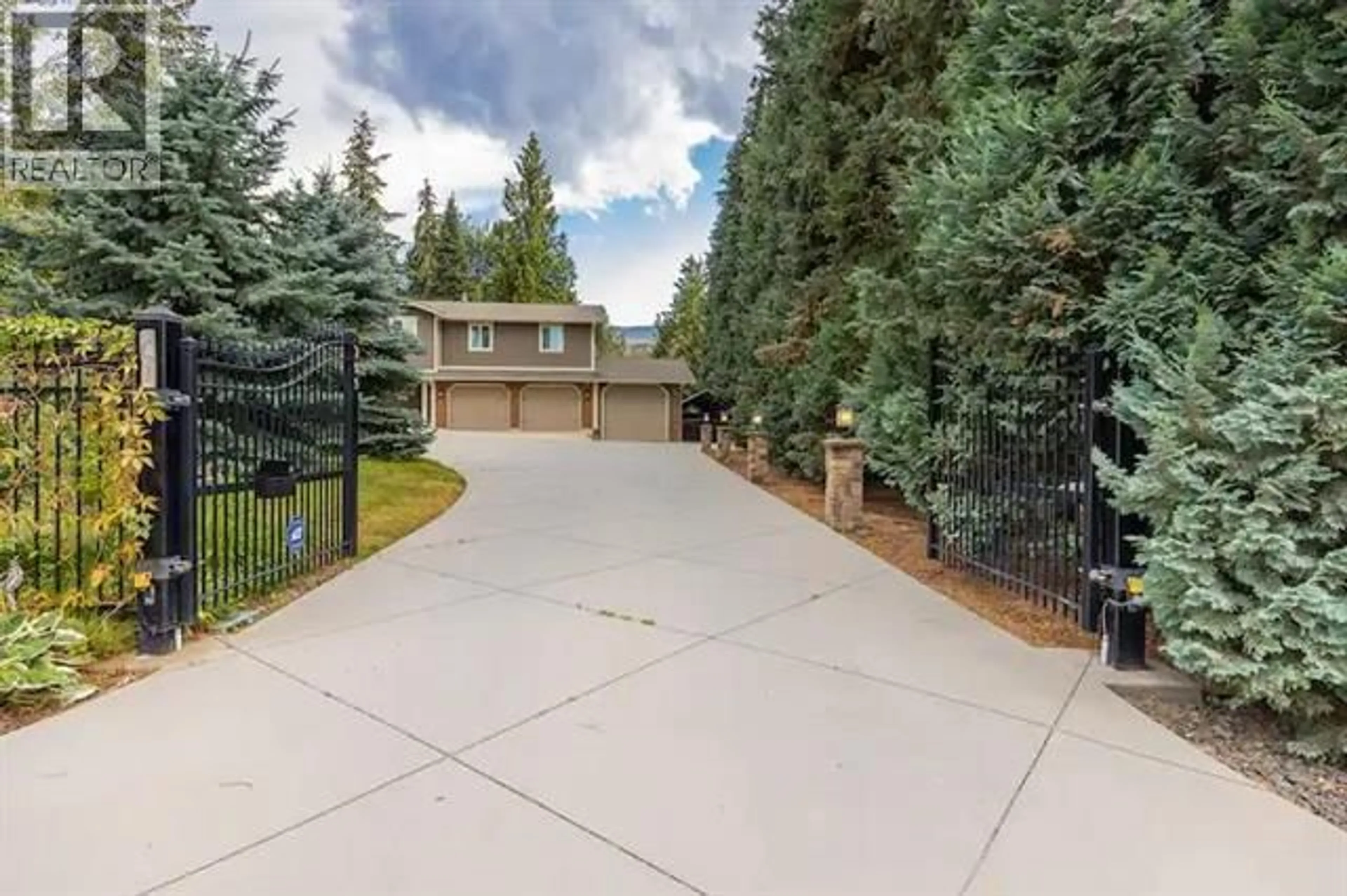 A pic from outside/outdoor area/front of a property/back of a property/a pic from drone, street for 759 MCCLURE ROAD, Kelowna British Columbia V1W1M2
