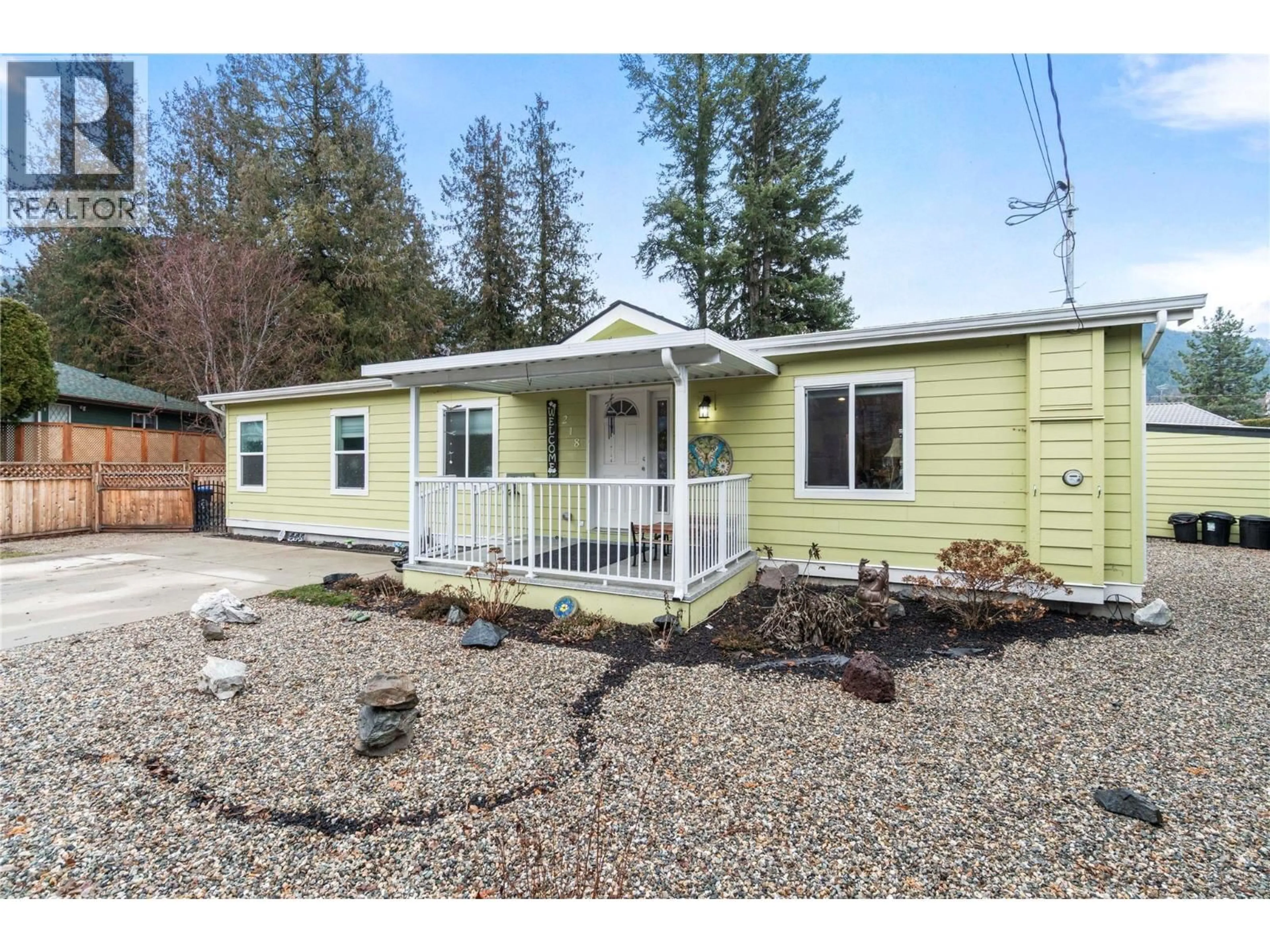 Home with vinyl exterior material, street for 218 ASPEN DRIVE, Chase British Columbia V0E1M0