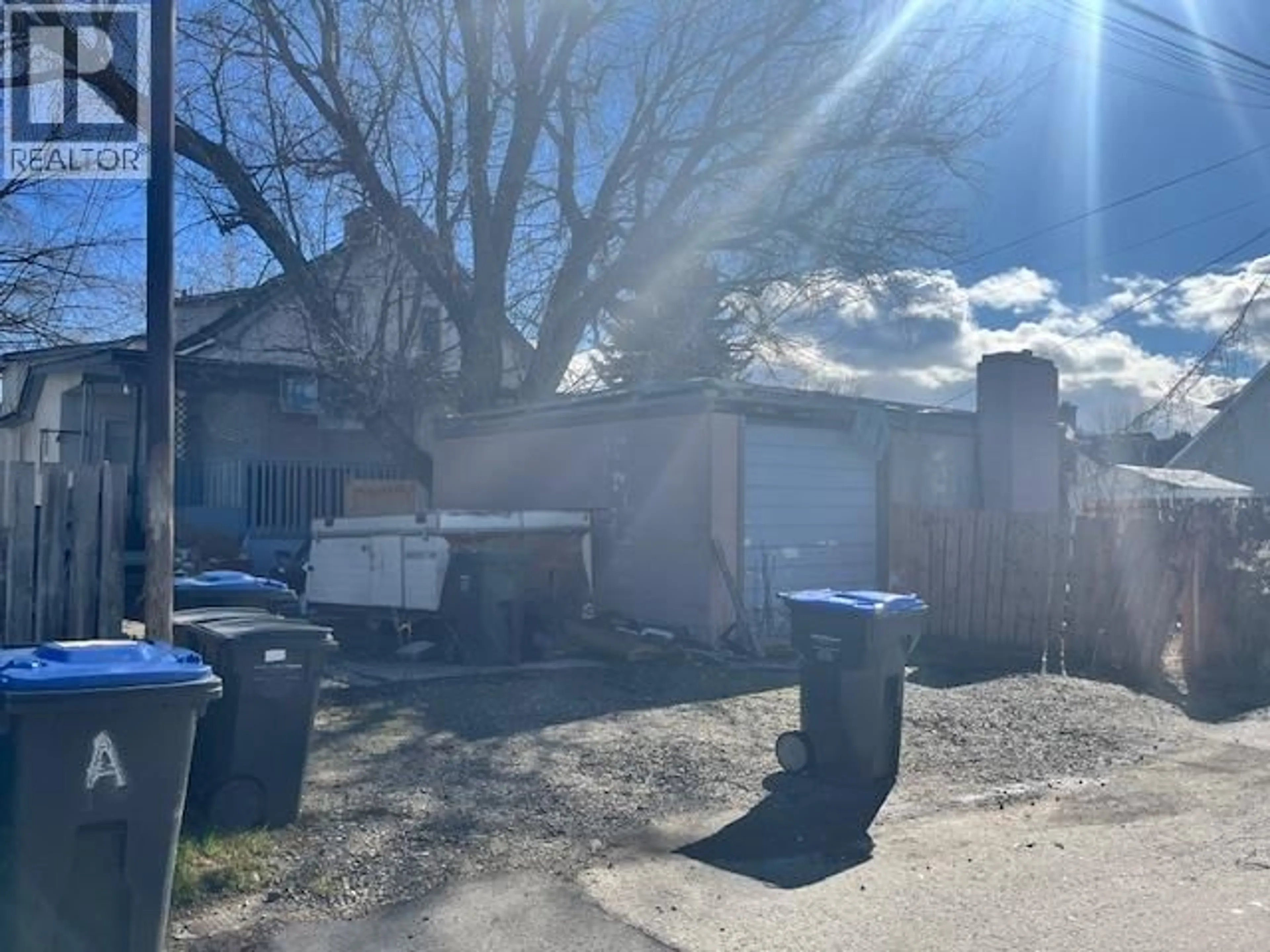 A pic from outside/outdoor area/front of a property/back of a property/a pic from drone, street for 2166 ABERDEEN STREET, Kelowna British Columbia V1Y2T4