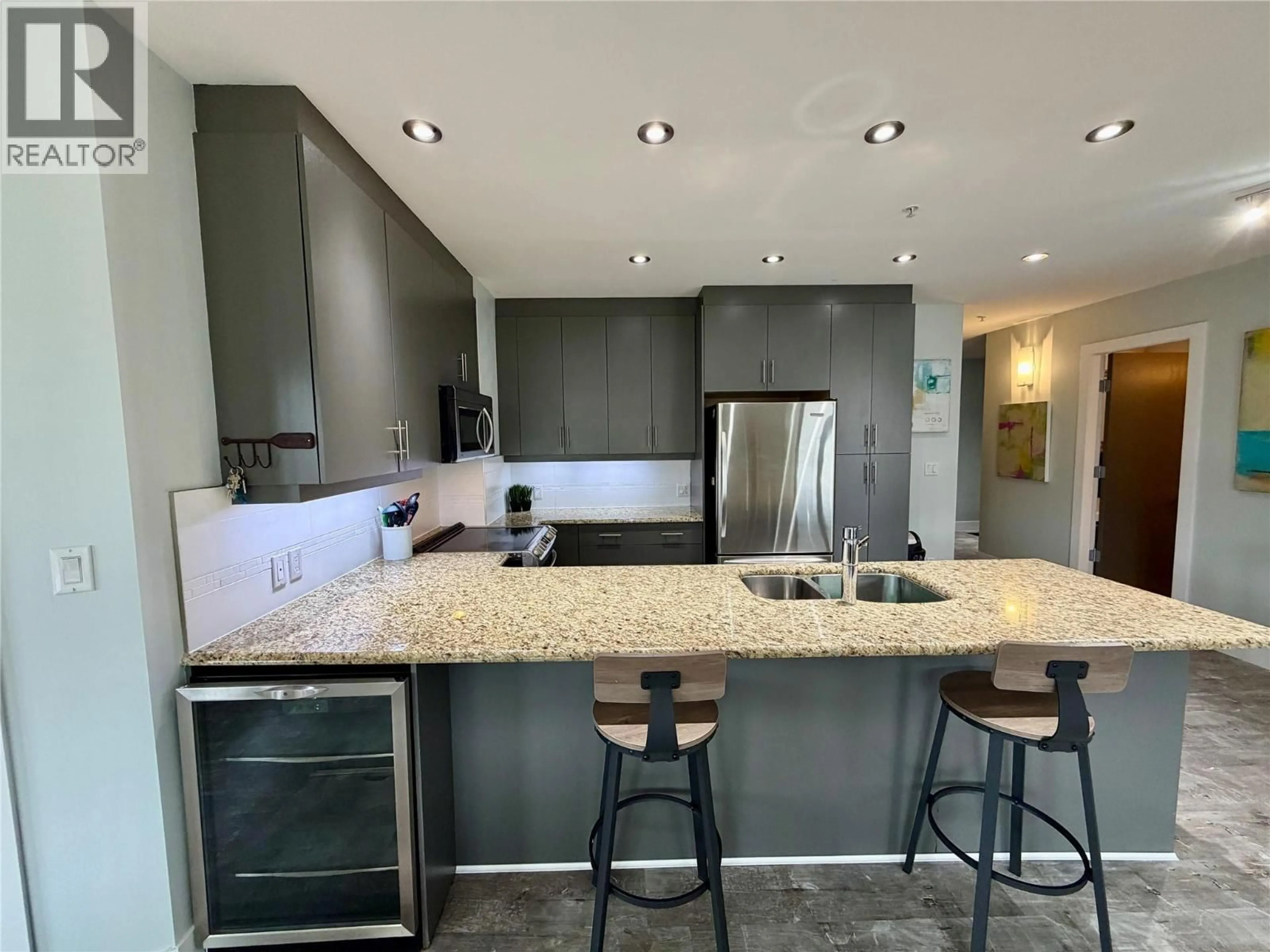 Open concept kitchen, ceramic/tile floor for 506 - 326 MARA LAKE LANE, Sicamous British Columbia V0E2V1