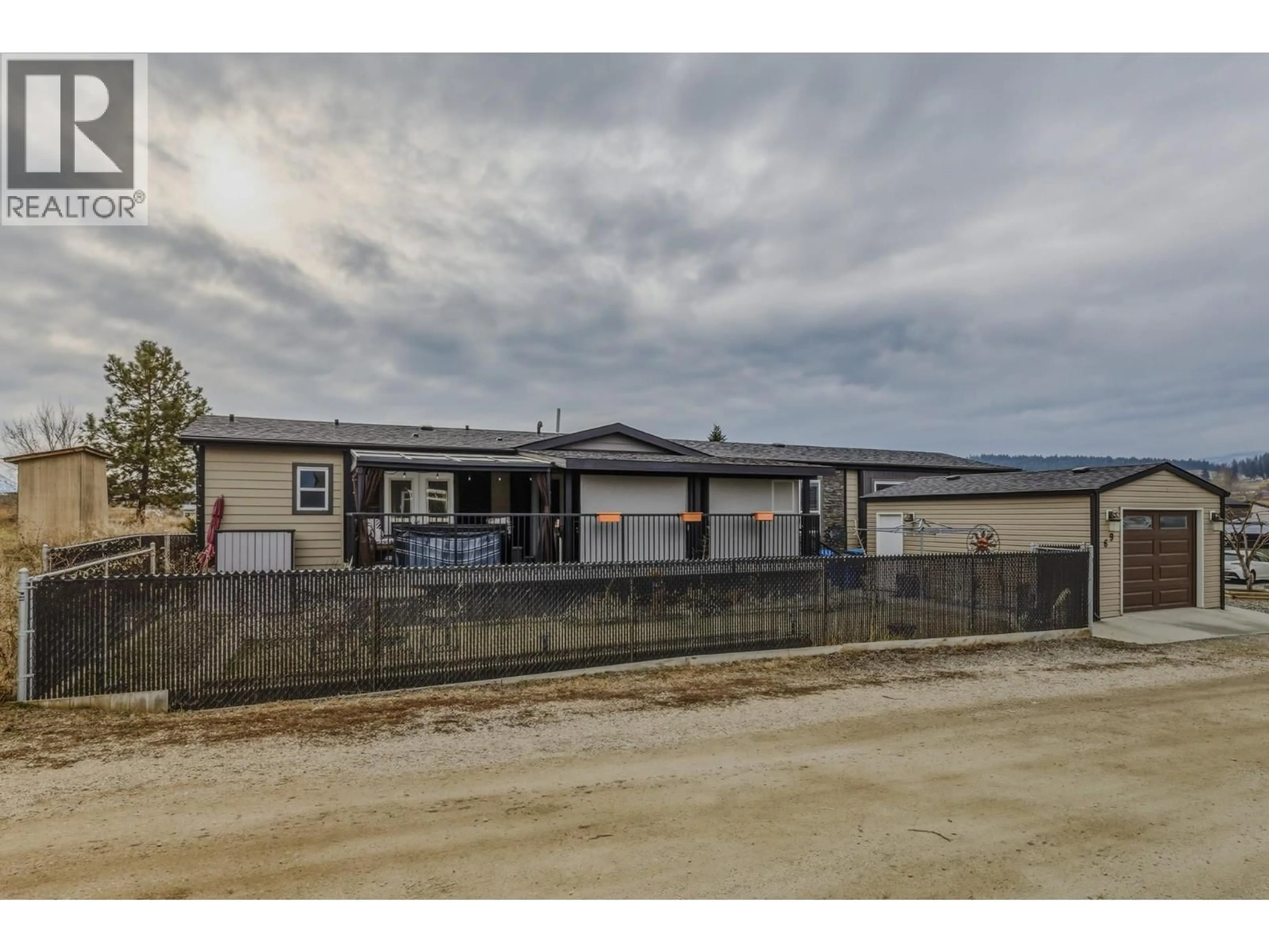 A pic from outside/outdoor area/front of a property/back of a property/a pic from drone, unknown for 69 - 8945 HWY 97N OTHER, Kelowna British Columbia V4V1E8