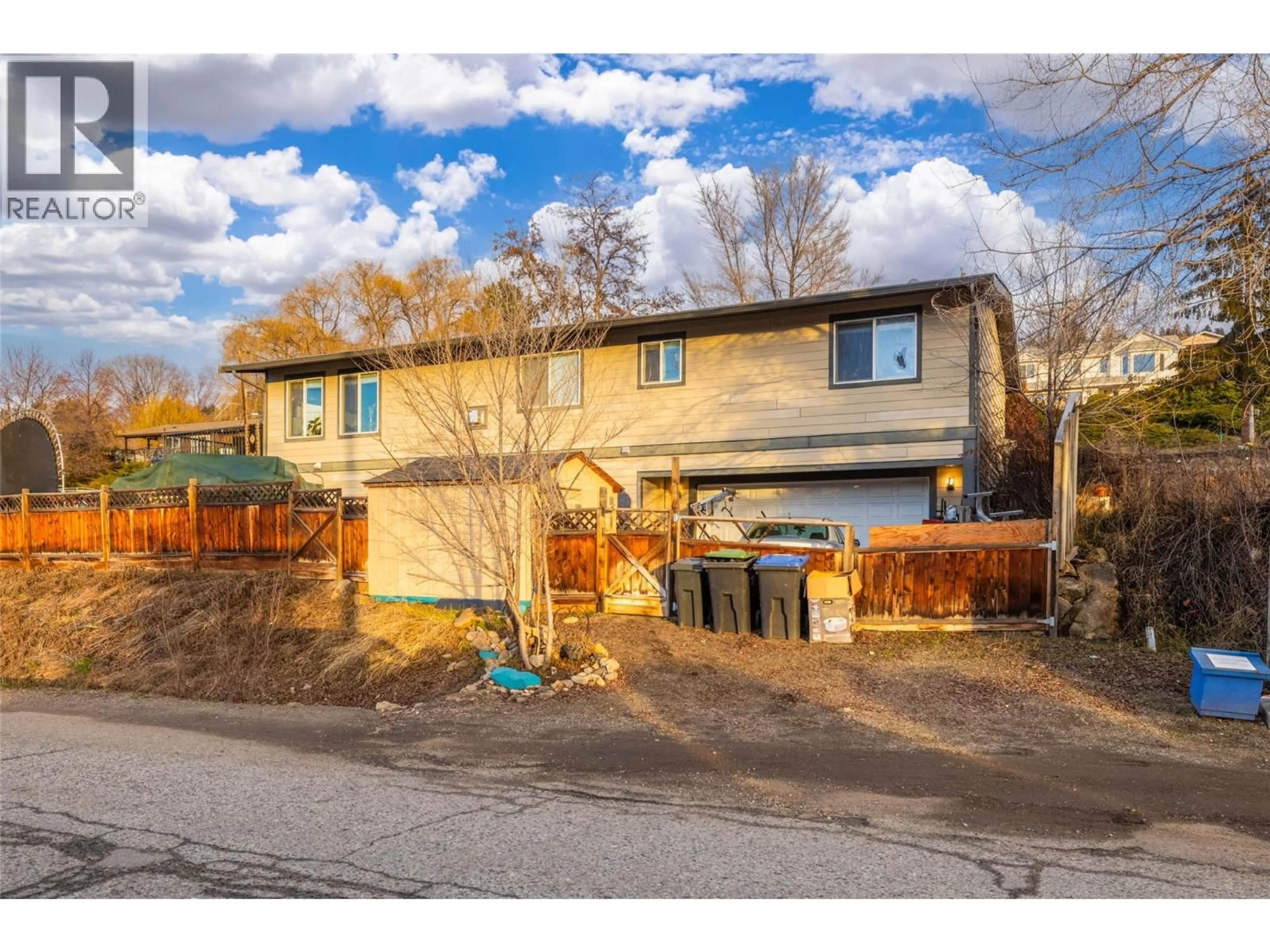 A pic from outside/outdoor area/front of a property/back of a property/a pic from drone, street for 10957 PHEASANT ROAD, Lake Country British Columbia V4V1W9