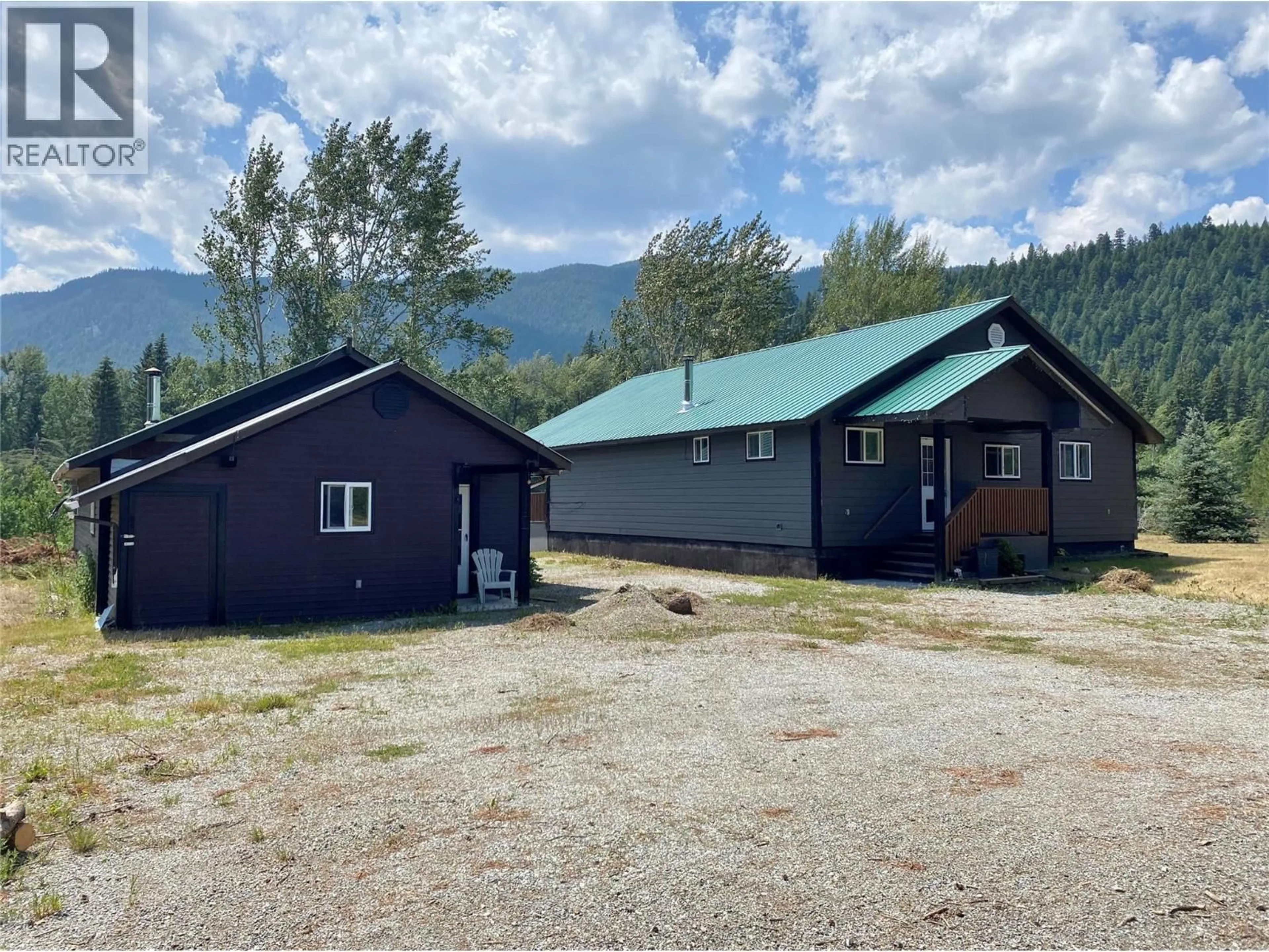 A pic from outside/outdoor area/front of a property/back of a property/a pic from drone, mountain view for 5325 33 HIGHWAY, Beaverdell British Columbia V0H1A0