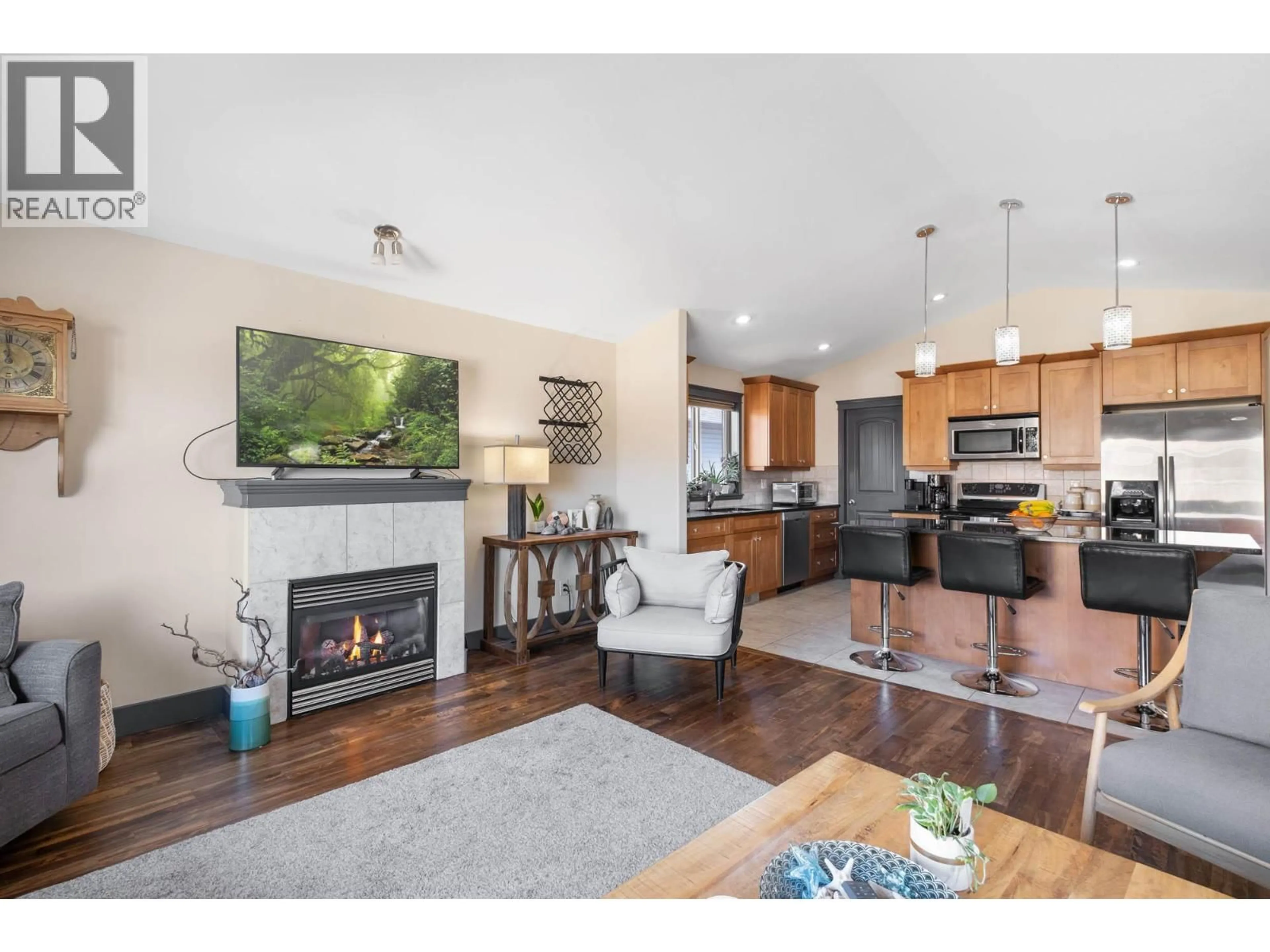 Open concept kitchen, wood/laminate floor for 3284 REDECOPP COURT, Lake Country British Columbia V4V1V4