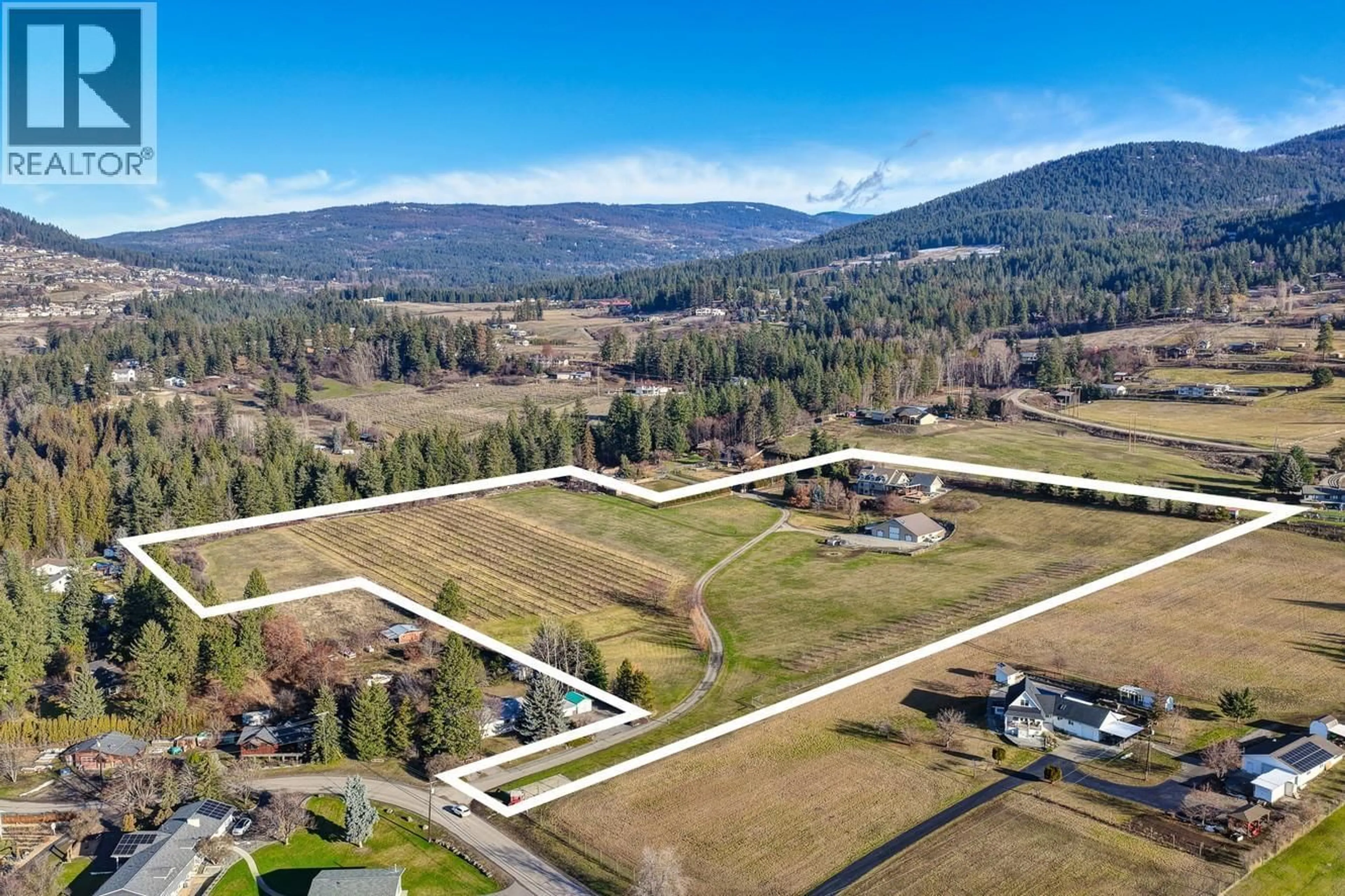 A pic from outside/outdoor area/front of a property/back of a property/a pic from drone, mountain view for 5393 EAST VERNON ROAD, Vernon British Columbia V1B3J7