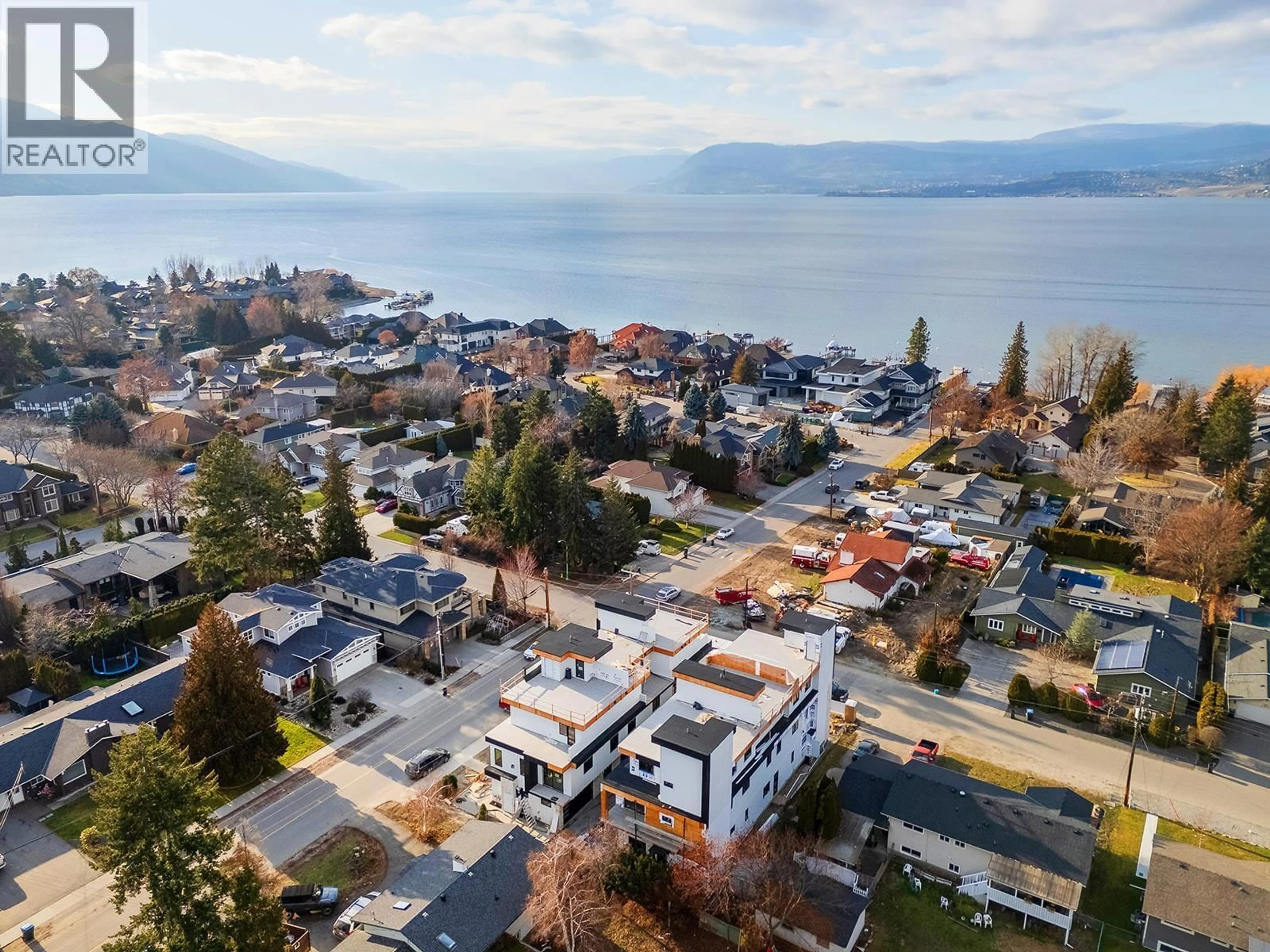 A pic from outside/outdoor area/front of a property/back of a property/a pic from drone, unknown for 1 - 4495 WALKER ROAD, Kelowna British Columbia V1W1G8