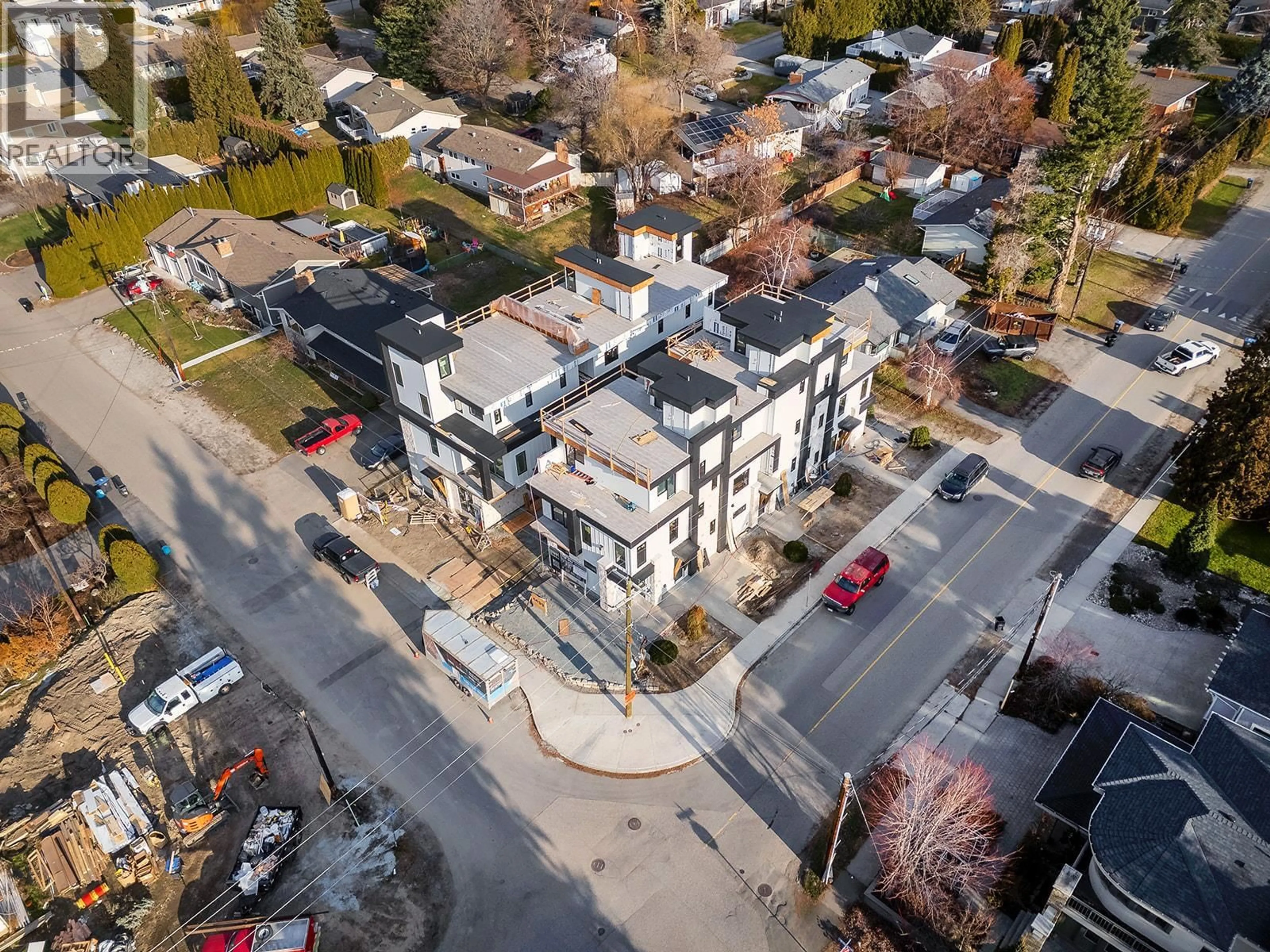 A pic from outside/outdoor area/front of a property/back of a property/a pic from drone, street for 2 - 4495 WALKER ROAD, Kelowna British Columbia V1W1G8