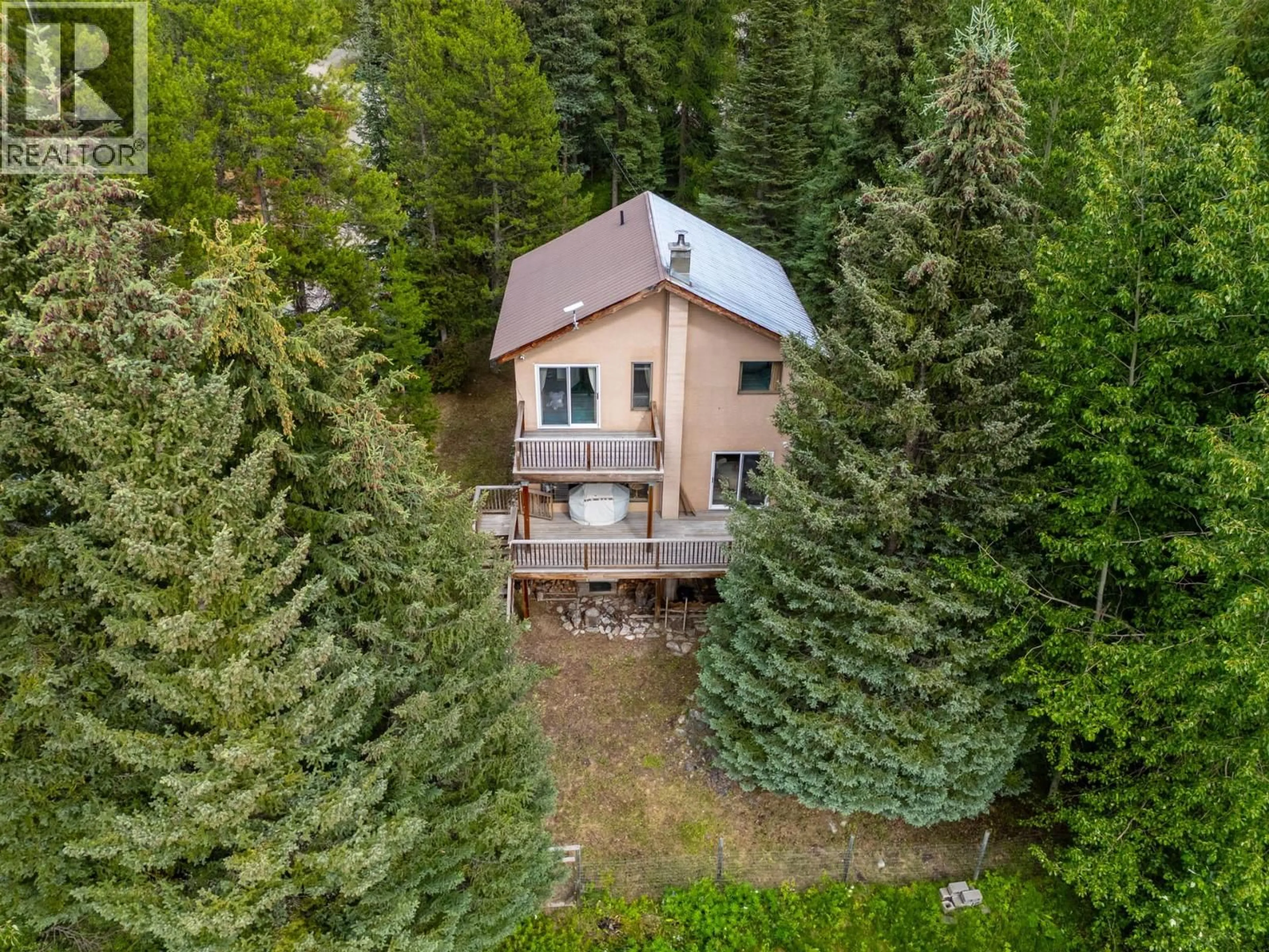 A pic from outside/outdoor area/front of a property/back of a property/a pic from drone, forest/trees view for 9245 PARADISE ROAD, Kelowna British Columbia V1P1K4
