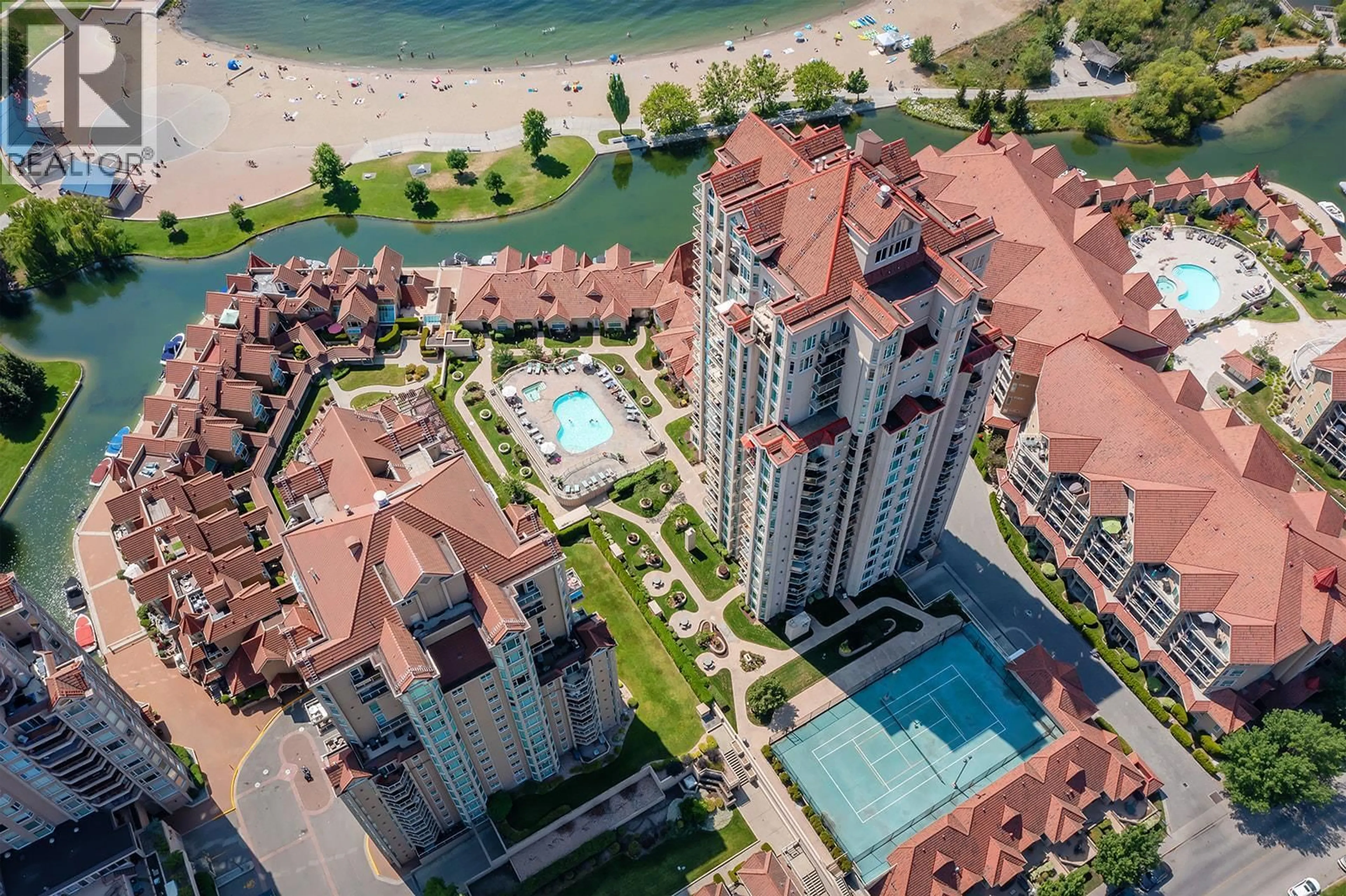 A pic from outside/outdoor area/front of a property/back of a property/a pic from drone, water/lake/river/ocean view for 1404 - 1128 SUNSET DRIVE, Kelowna British Columbia V1Y9W7