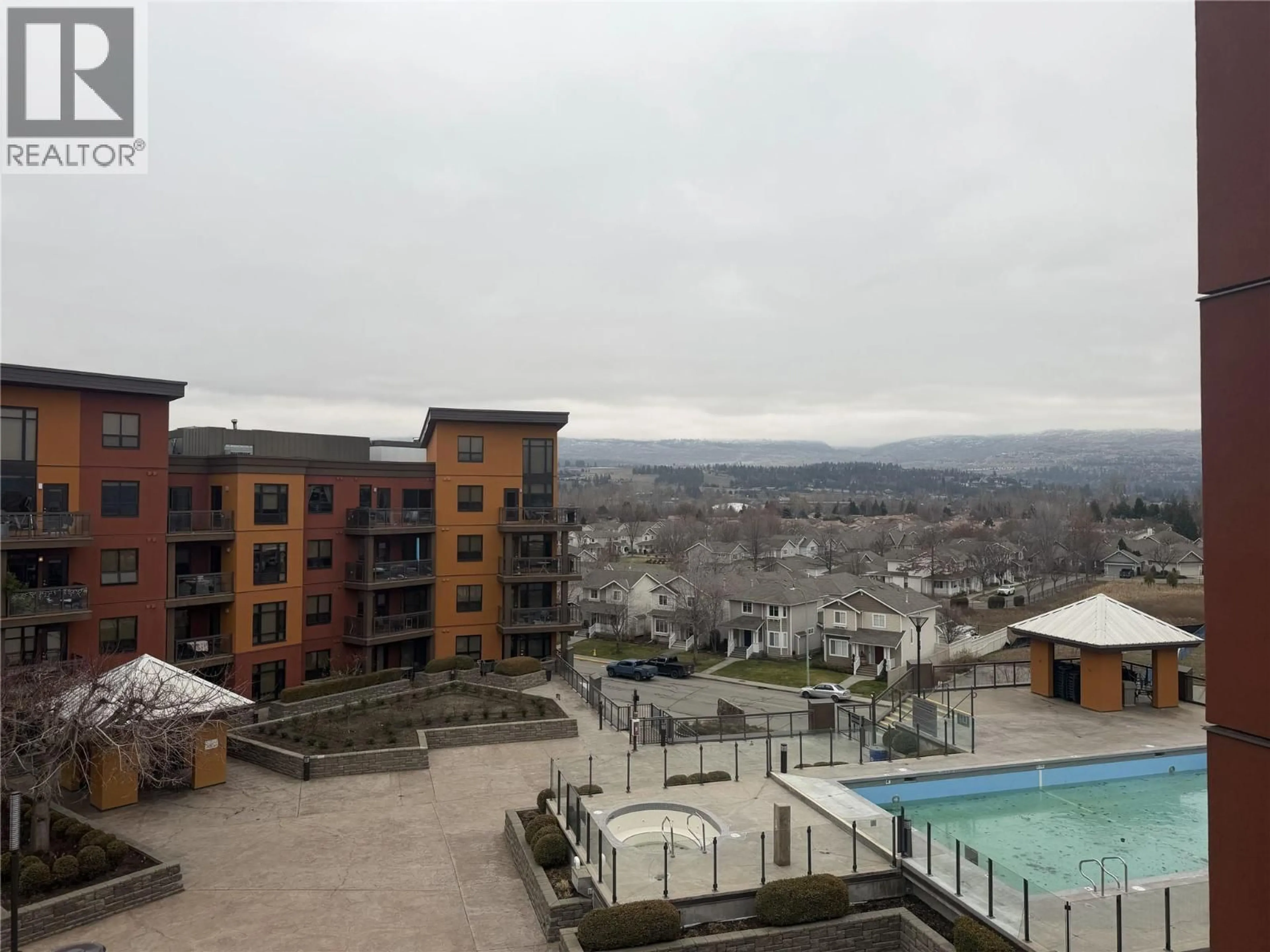 A pic from outside/outdoor area/front of a property/back of a property/a pic from drone, city buildings view from balcony for 605 - 654 COOK ROAD, Kelowna British Columbia V1W3G7