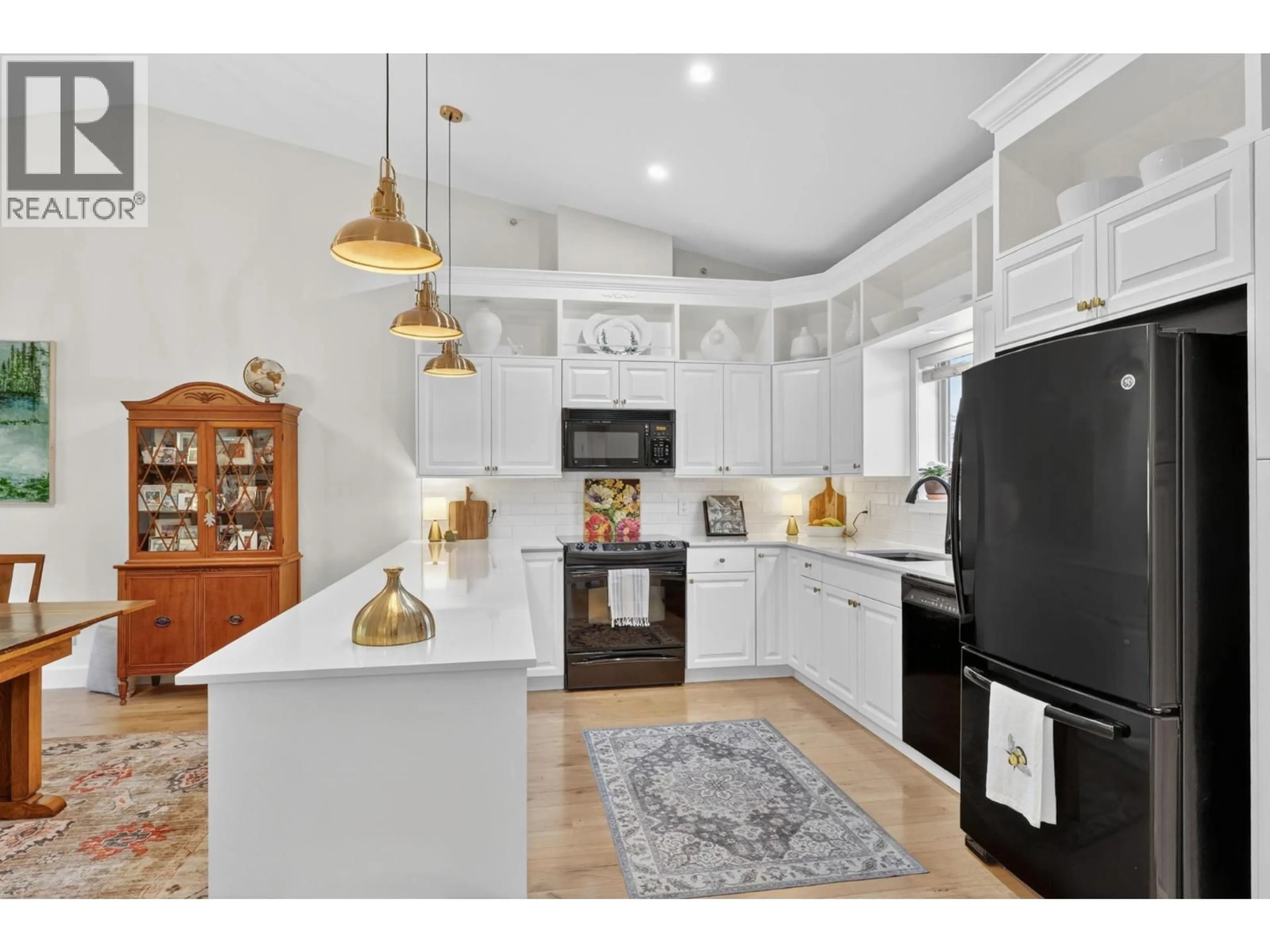 Open concept kitchen, unknown for 301 - 3996 BEACH AVENUE, Peachland British Columbia V0H1X5