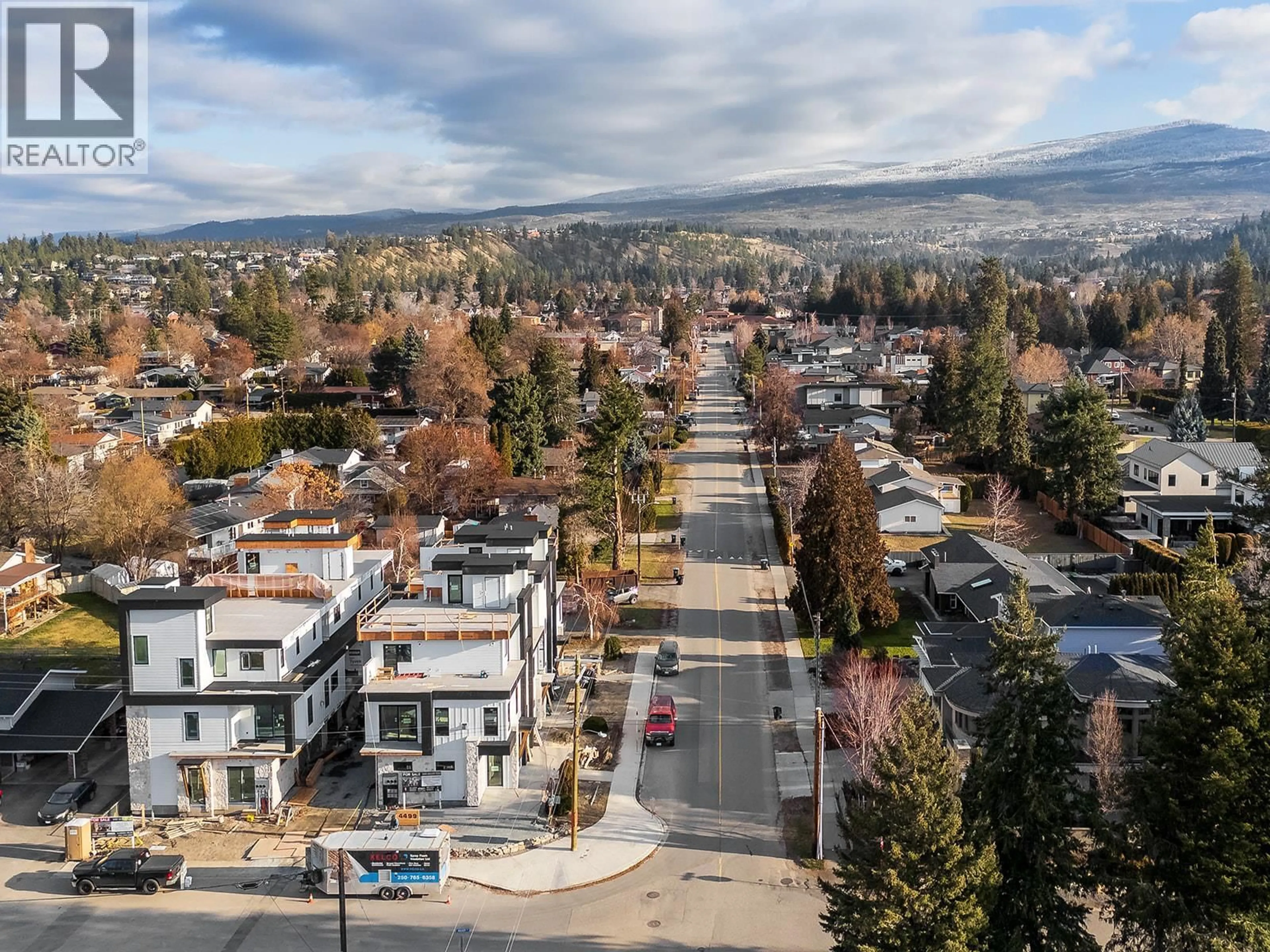 A pic from outside/outdoor area/front of a property/back of a property/a pic from drone, mountain view for 4499 WALKER ROAD, Kelowna British Columbia V1W1G8