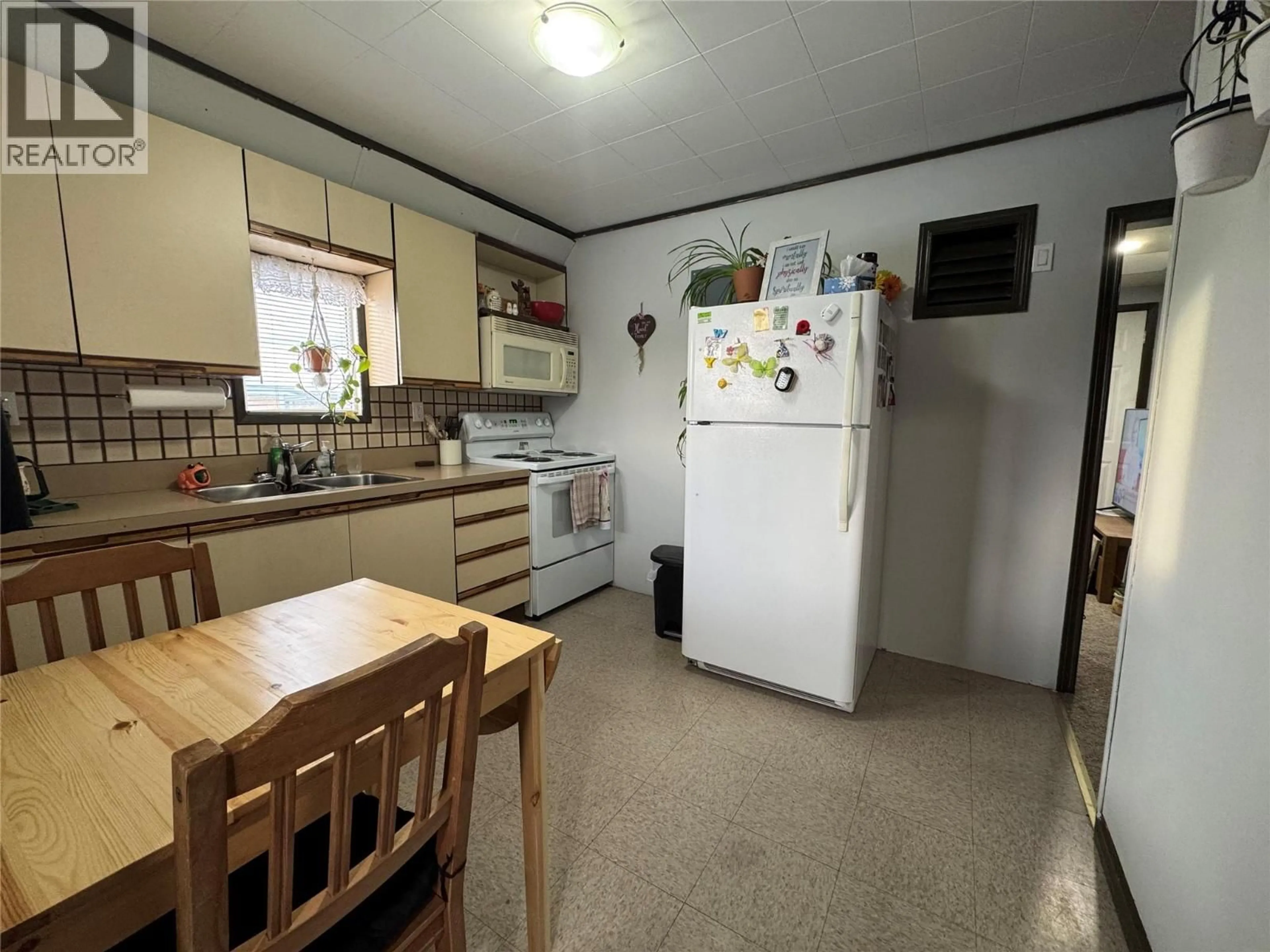 Standard kitchen, unknown for 5007 SUKRIT PARMAR LANE, Pouce Coupe British Columbia V0C2C0