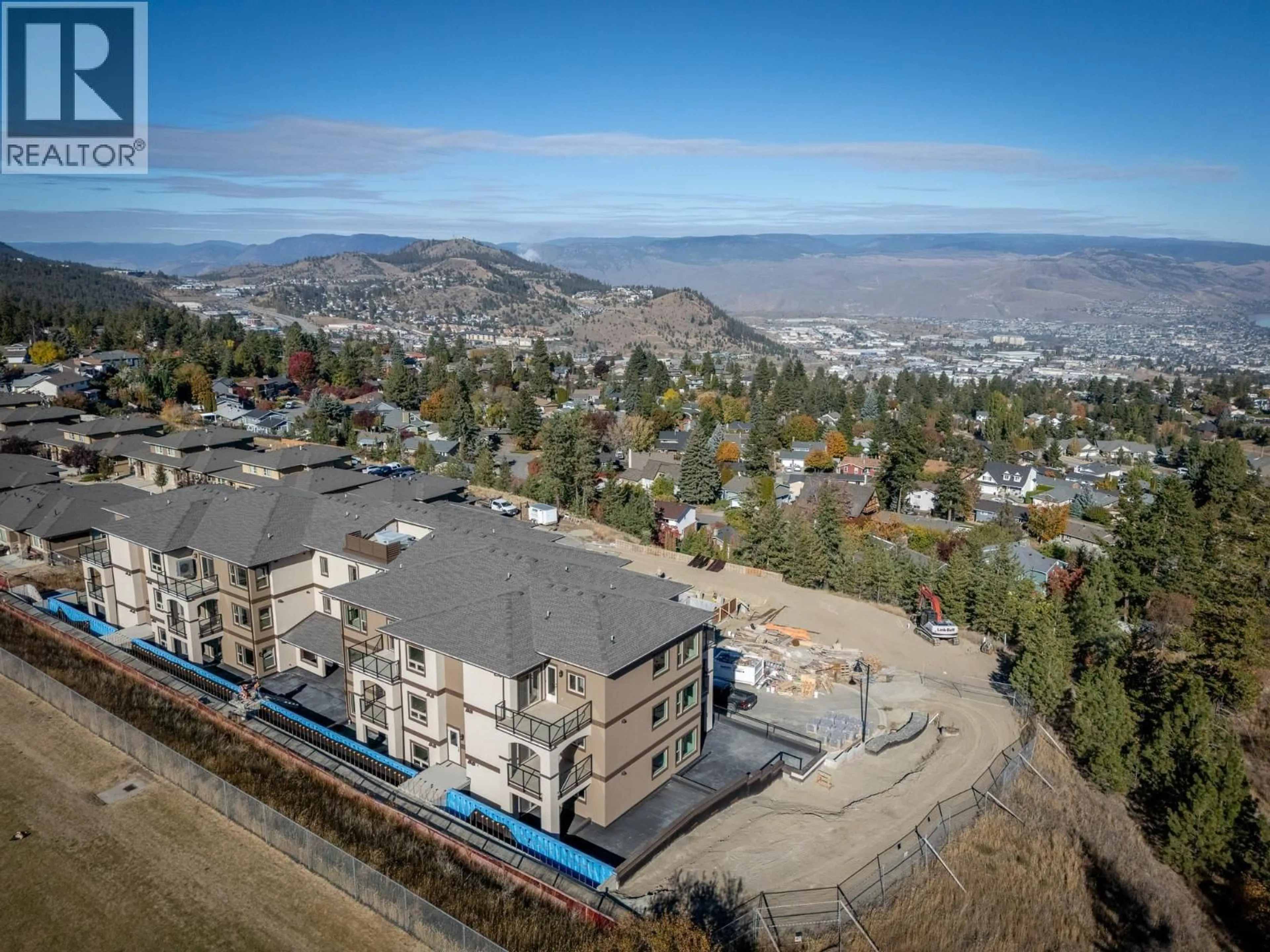 A pic from outside/outdoor area/front of a property/back of a property/a pic from drone, mountain view for 203 - 2171 VAN HORNE DRIVE, Kamloops British Columbia V1S0E2