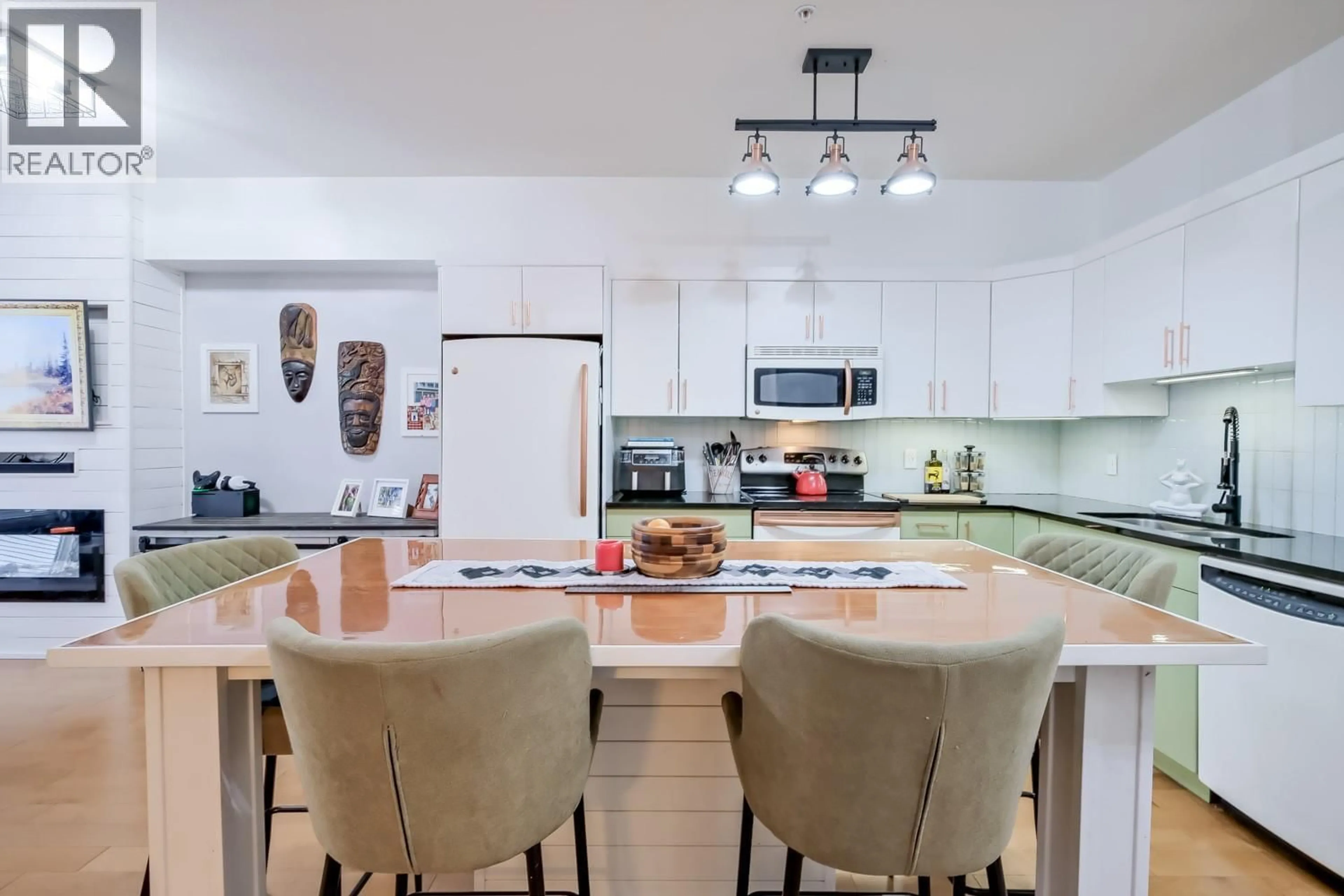 Open concept kitchen, ceramic/tile floor for 404 - 3645 CARRINGTON ROAD, West Kelowna British Columbia V4T3G9