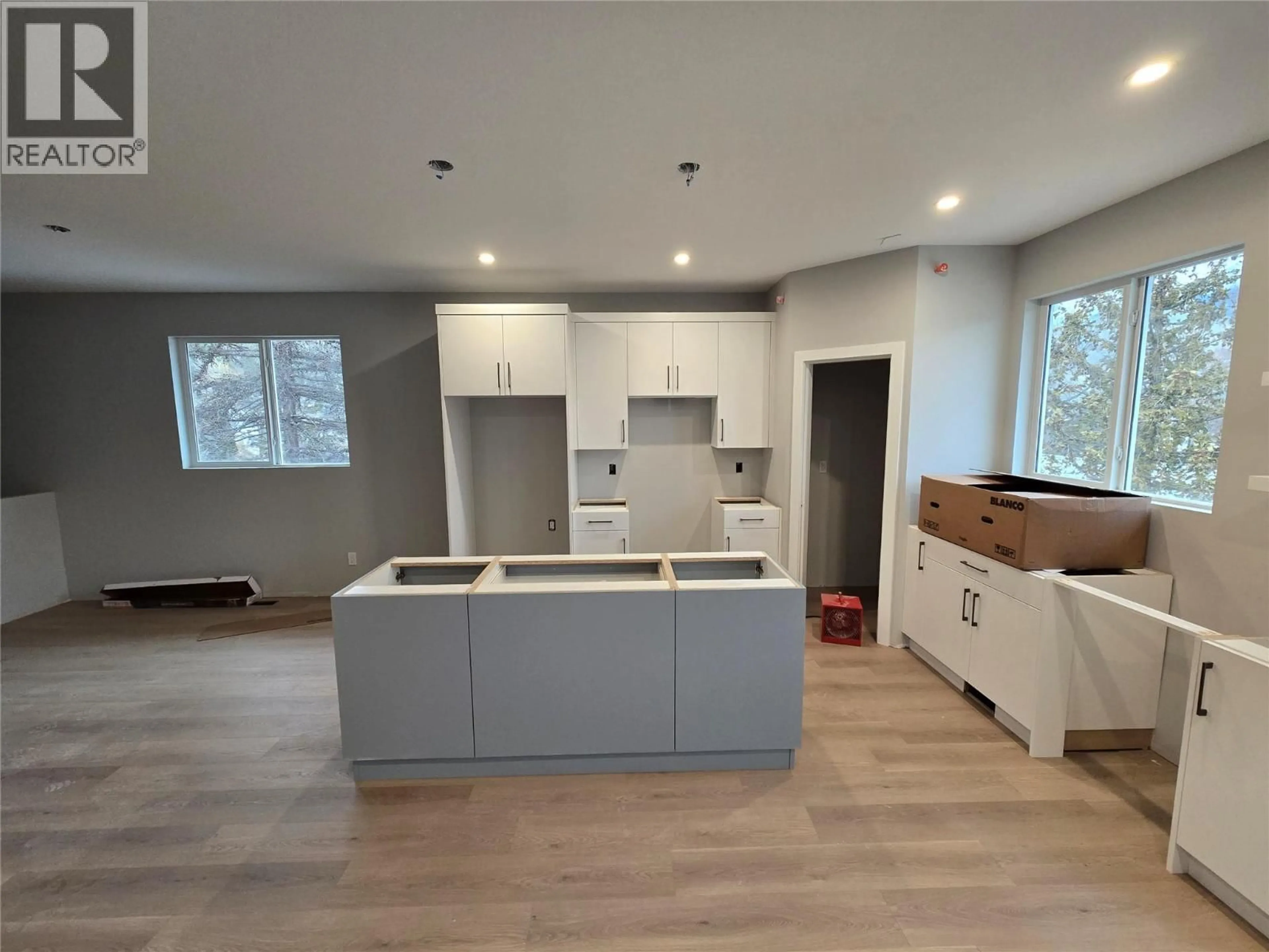 Open concept kitchen, wood/laminate floor for 5868 DALLAS DRIVE, Kamloops British Columbia V2C4X2