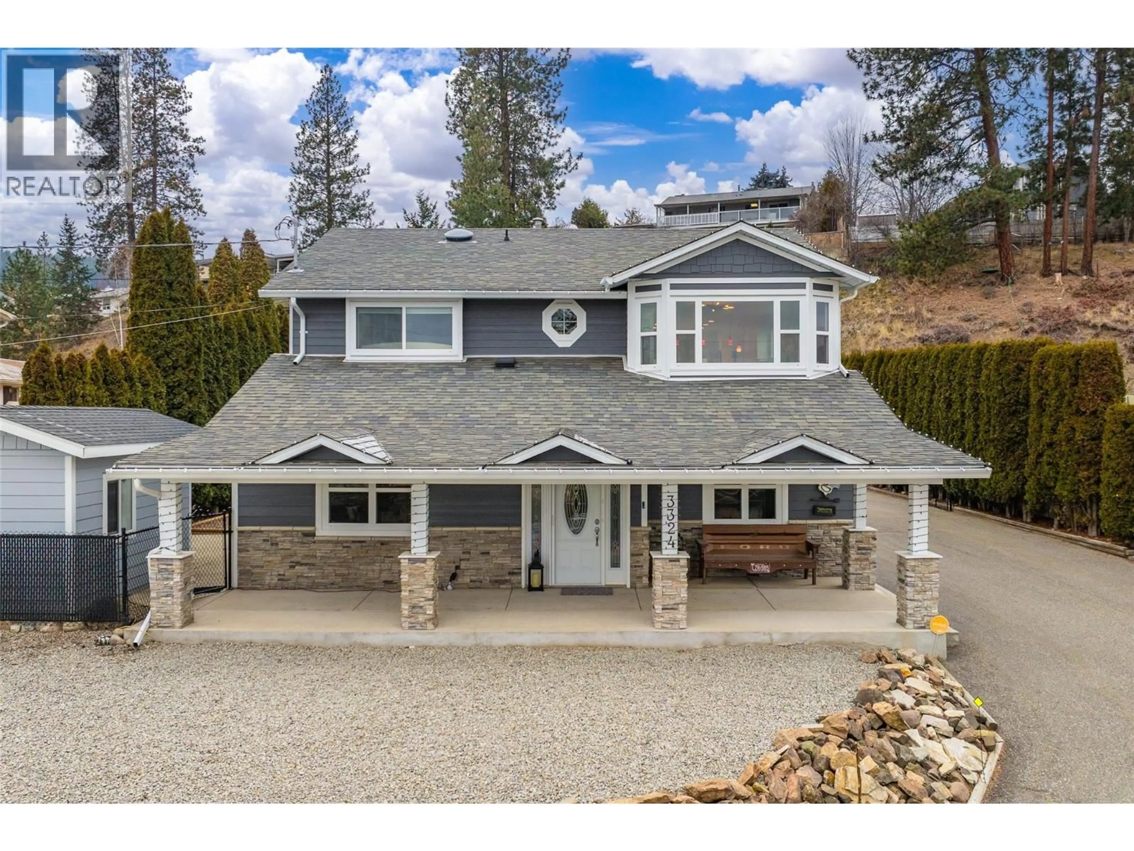 Home with vinyl exterior material, street for 3324 MCGINNIS ROAD, West Kelowna British Columbia V4T1B5