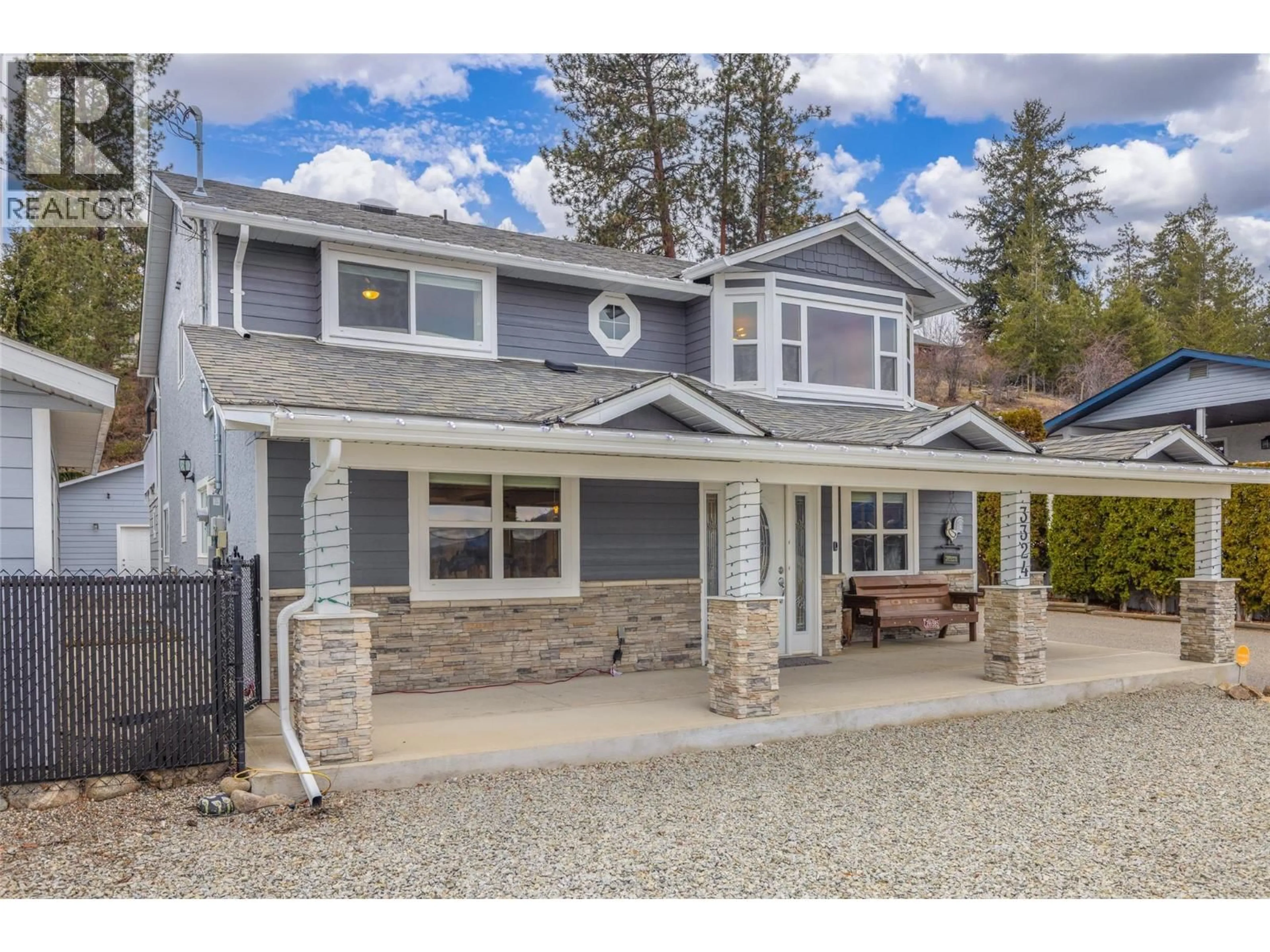 Home with vinyl exterior material, street for 3324 MCGINNIS ROAD, West Kelowna British Columbia V4T1B5