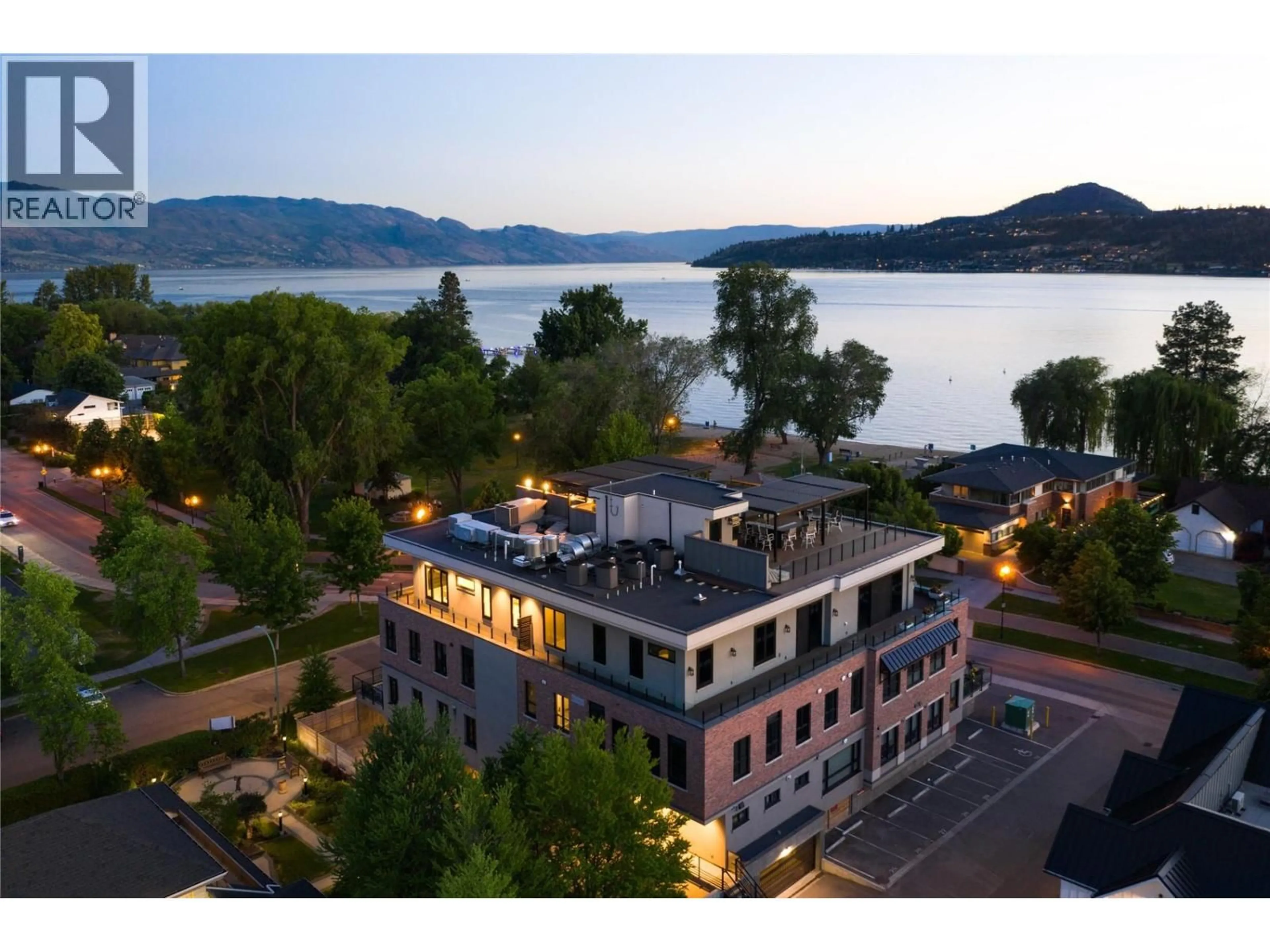A pic from outside/outdoor area/front of a property/back of a property/a pic from drone, water/lake/river/ocean view for 301 - 2245 ABBOTT STREET, Kelowna British Columbia V1Y1E2