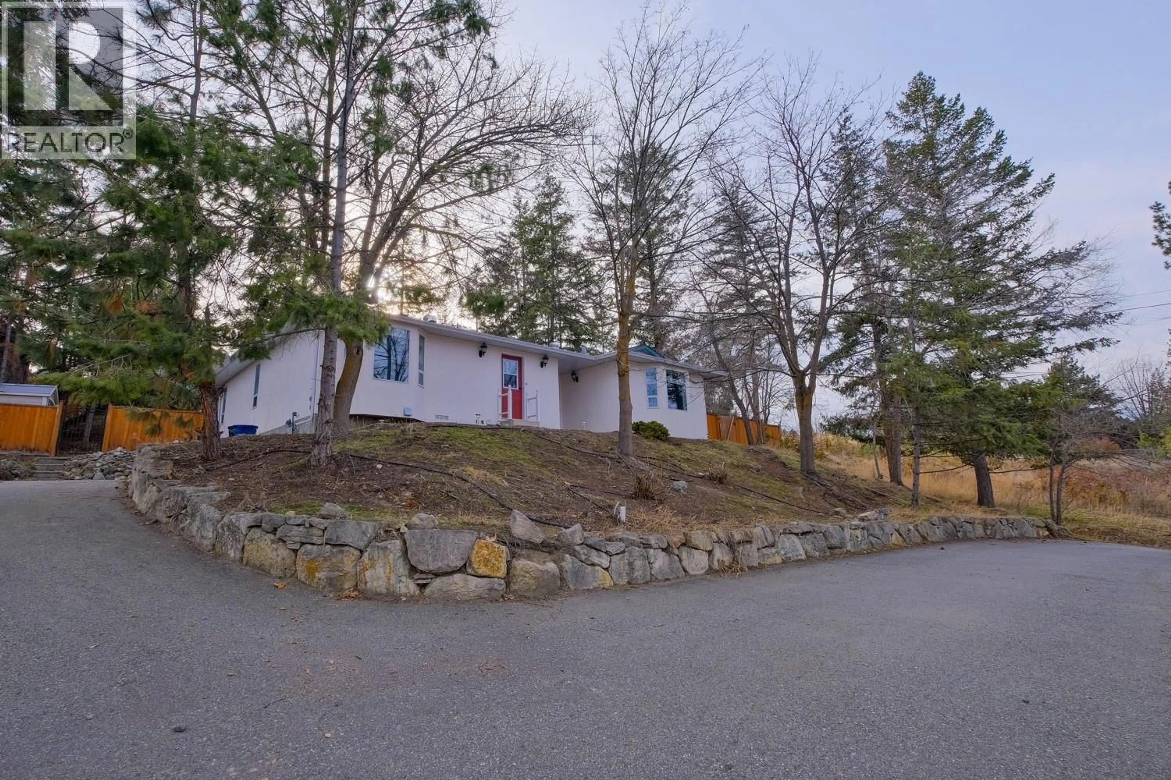 A pic from outside/outdoor area/front of a property/back of a property/a pic from drone, mountain view for 5271 CHUTE LAKE ROAD, Kelowna British Columbia V1W4K8