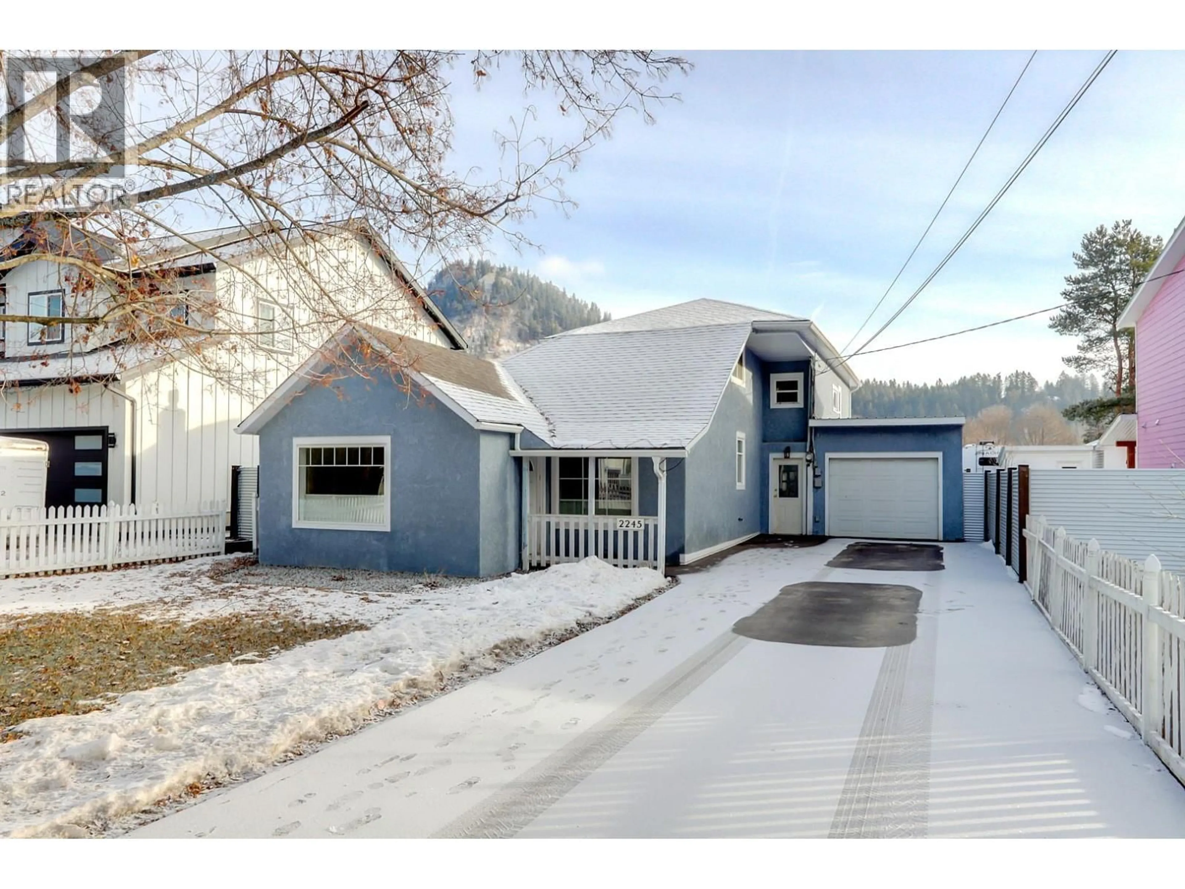 Home with vinyl exterior material, street for 2245 SHUSWAP AVENUE, Lumby British Columbia V0E2G0