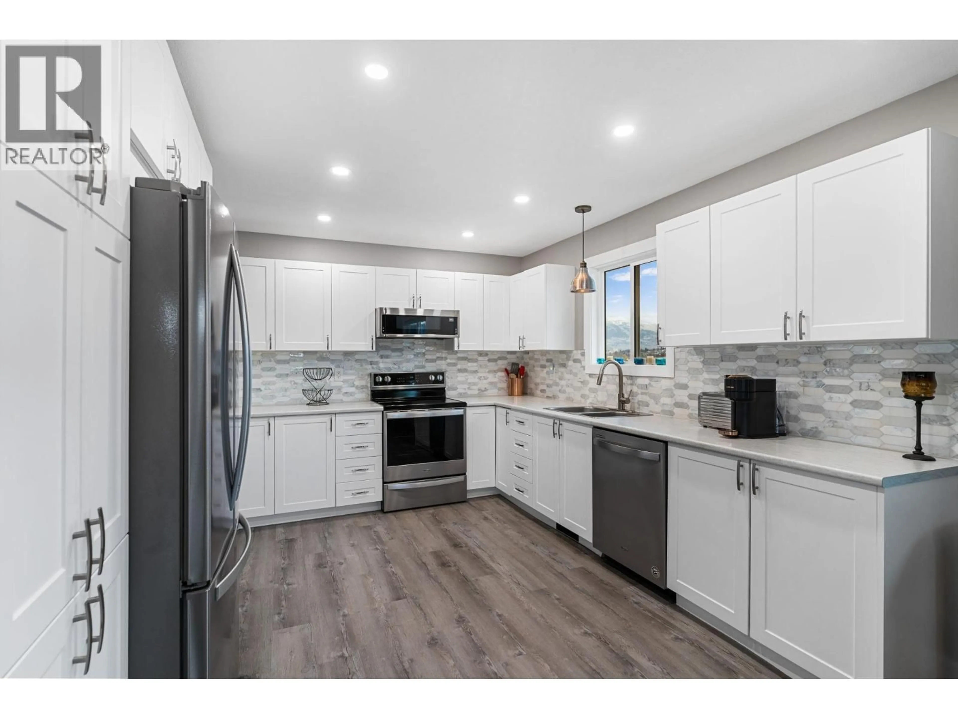 Open concept kitchen, ceramic/tile floor for 2913 PROSPECT DRIVE, Vernon British Columbia V1T8J2