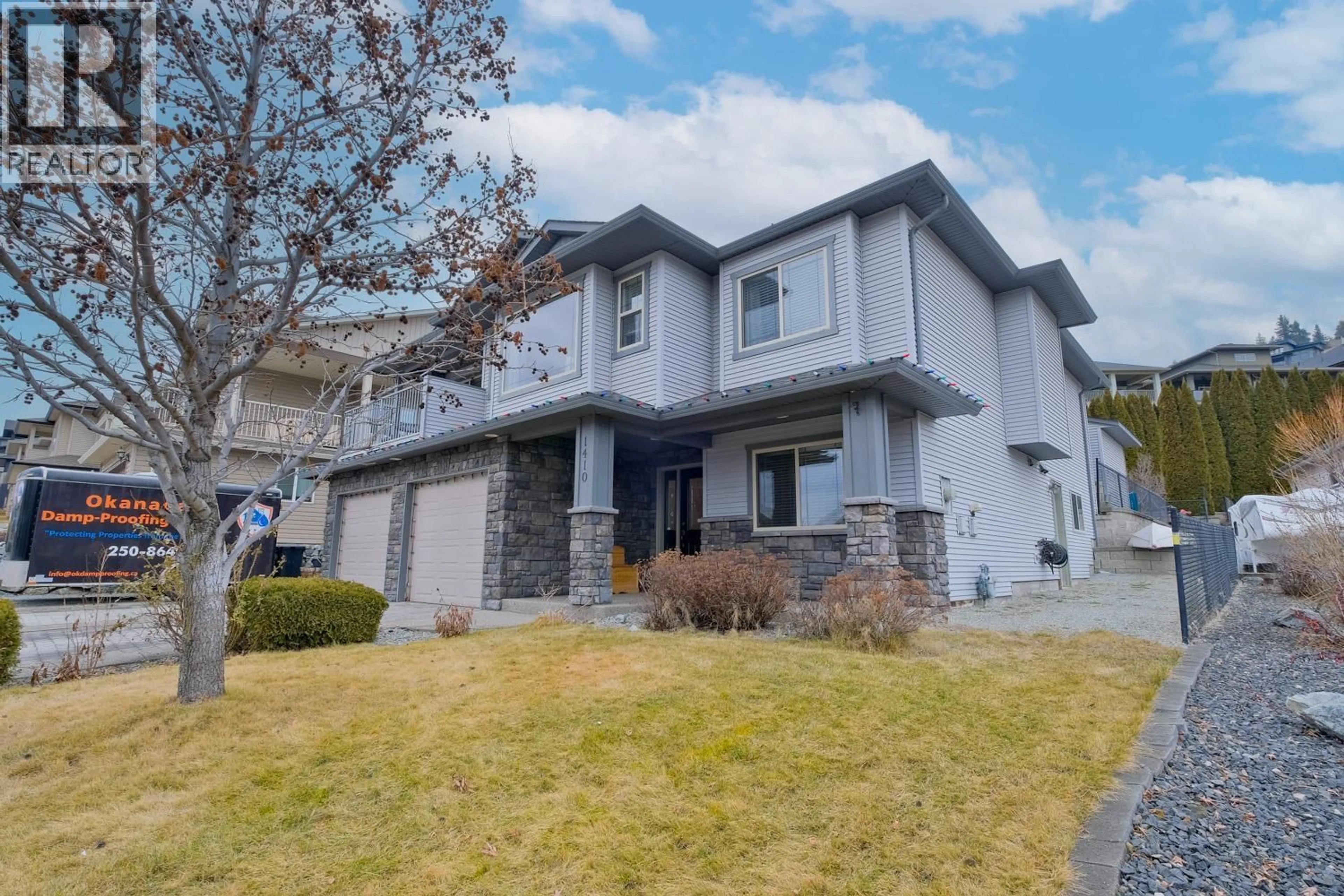 Home with vinyl exterior material, street for 1410 KENDRA COURT, Kelowna British Columbia V1P1P1