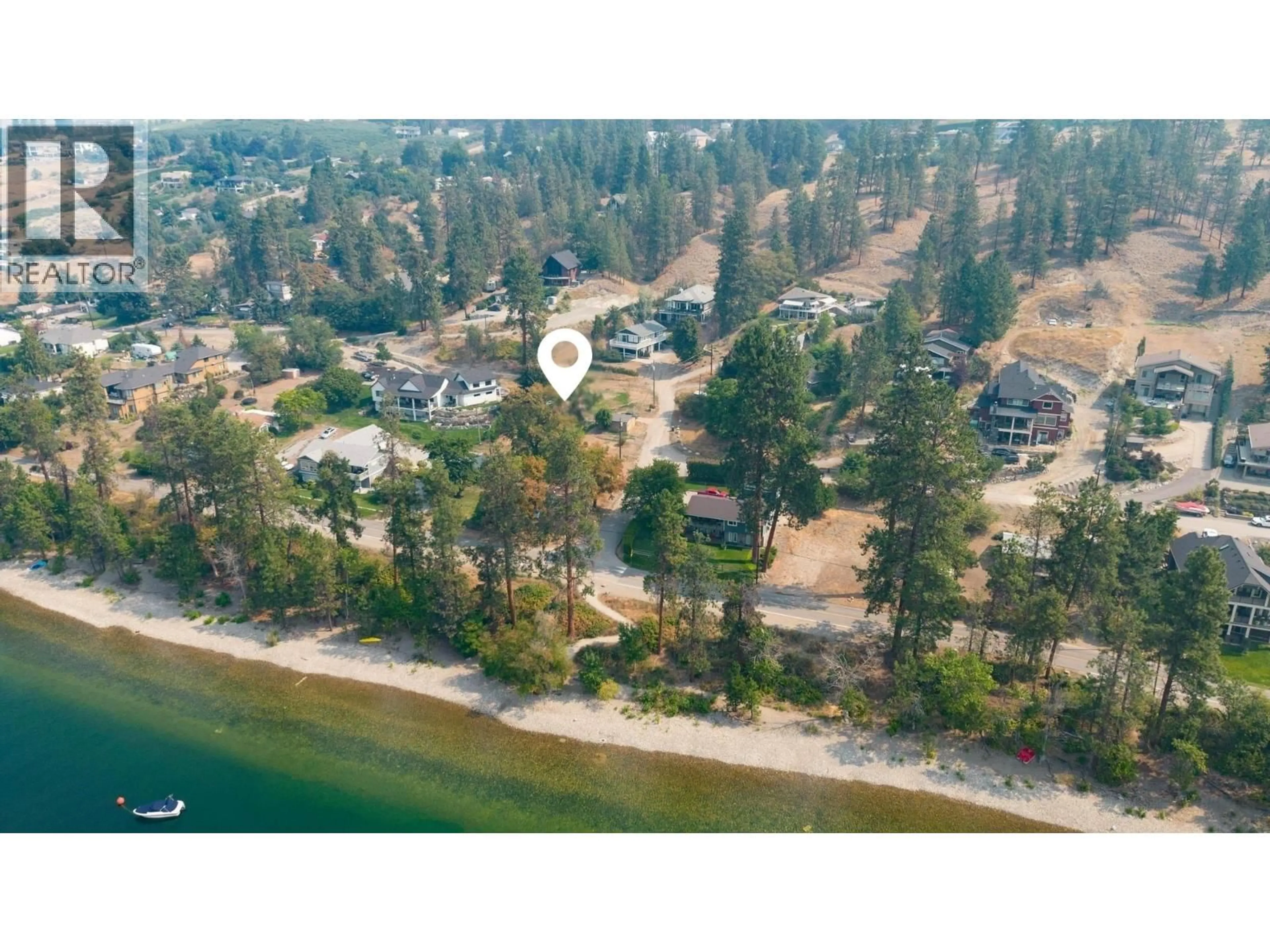 A pic from outside/outdoor area/front of a property/back of a property/a pic from drone, water/lake/river/ocean view for 1210 EIGHTH STREET, Lake Country British Columbia V4V2J5