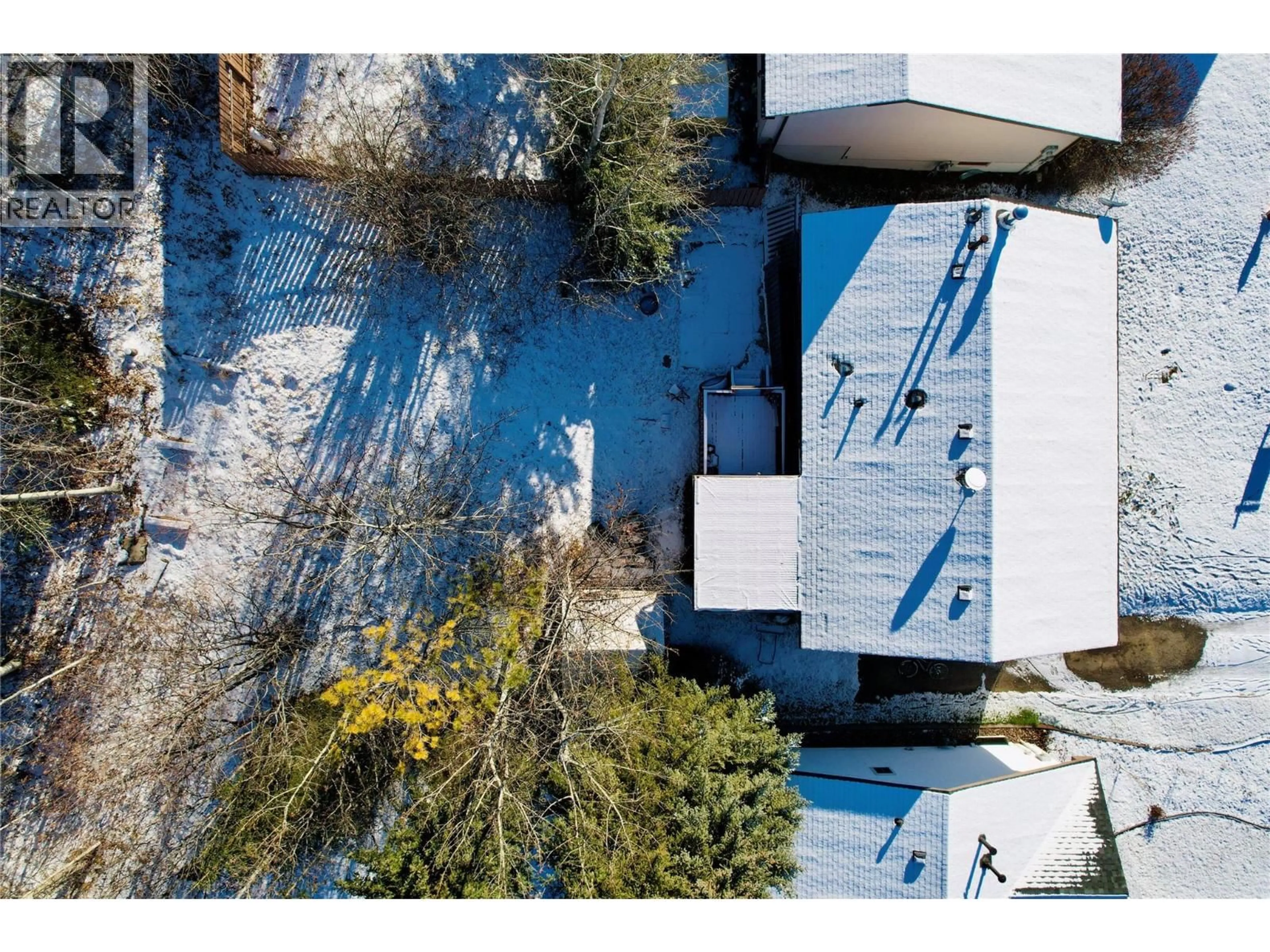 A pic from outside/outdoor area/front of a property/back of a property/a pic from drone, unknown for 156 GWILLIM CRESCENT, Tumbler Ridge British Columbia V0C2W0