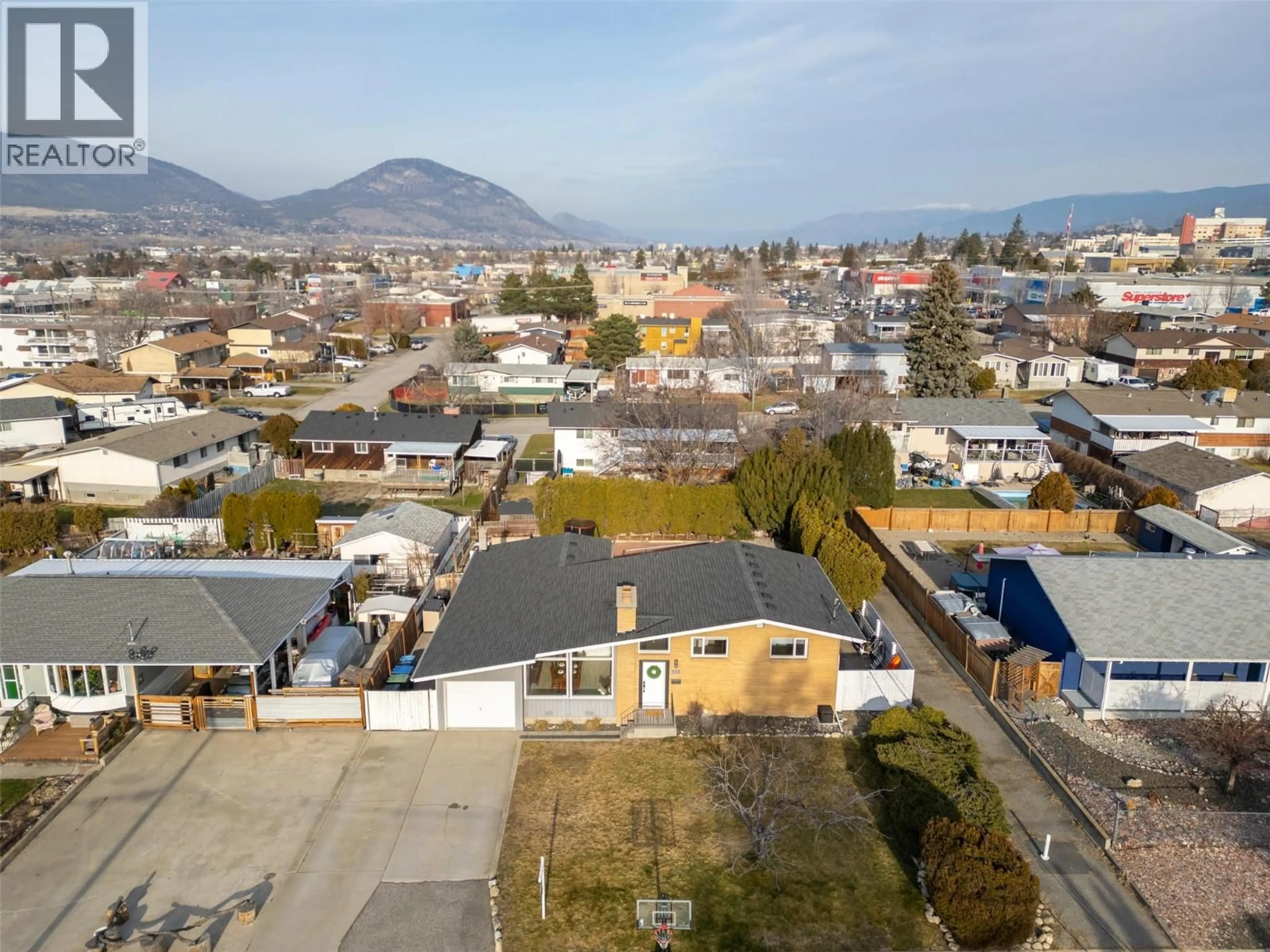 A pic from outside/outdoor area/front of a property/back of a property/a pic from drone, mountain view for 151 SECREST PLACE, Penticton British Columbia V2A3R2