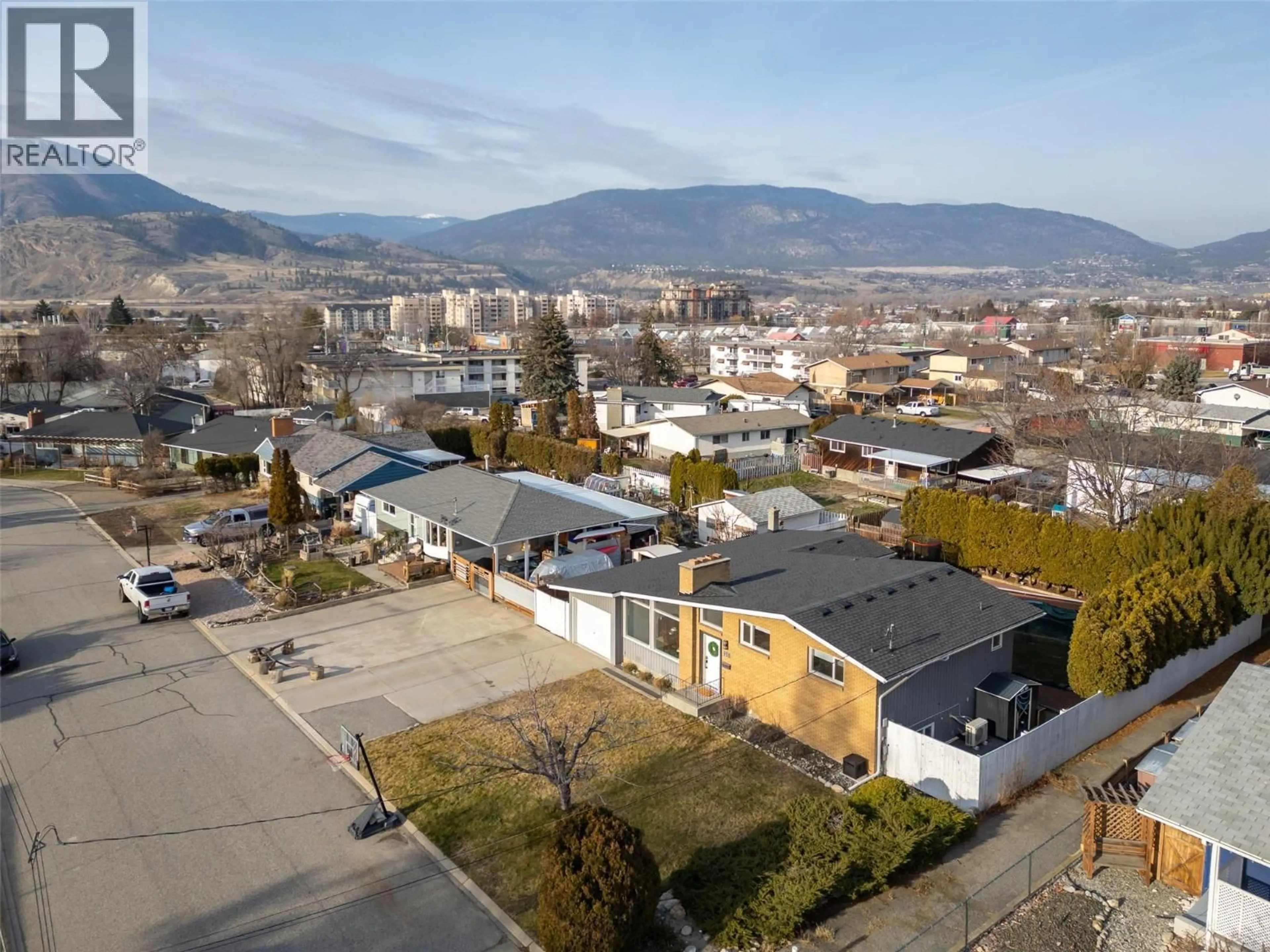A pic from outside/outdoor area/front of a property/back of a property/a pic from drone, mountain view for 151 SECREST PLACE, Penticton British Columbia V2A3R2