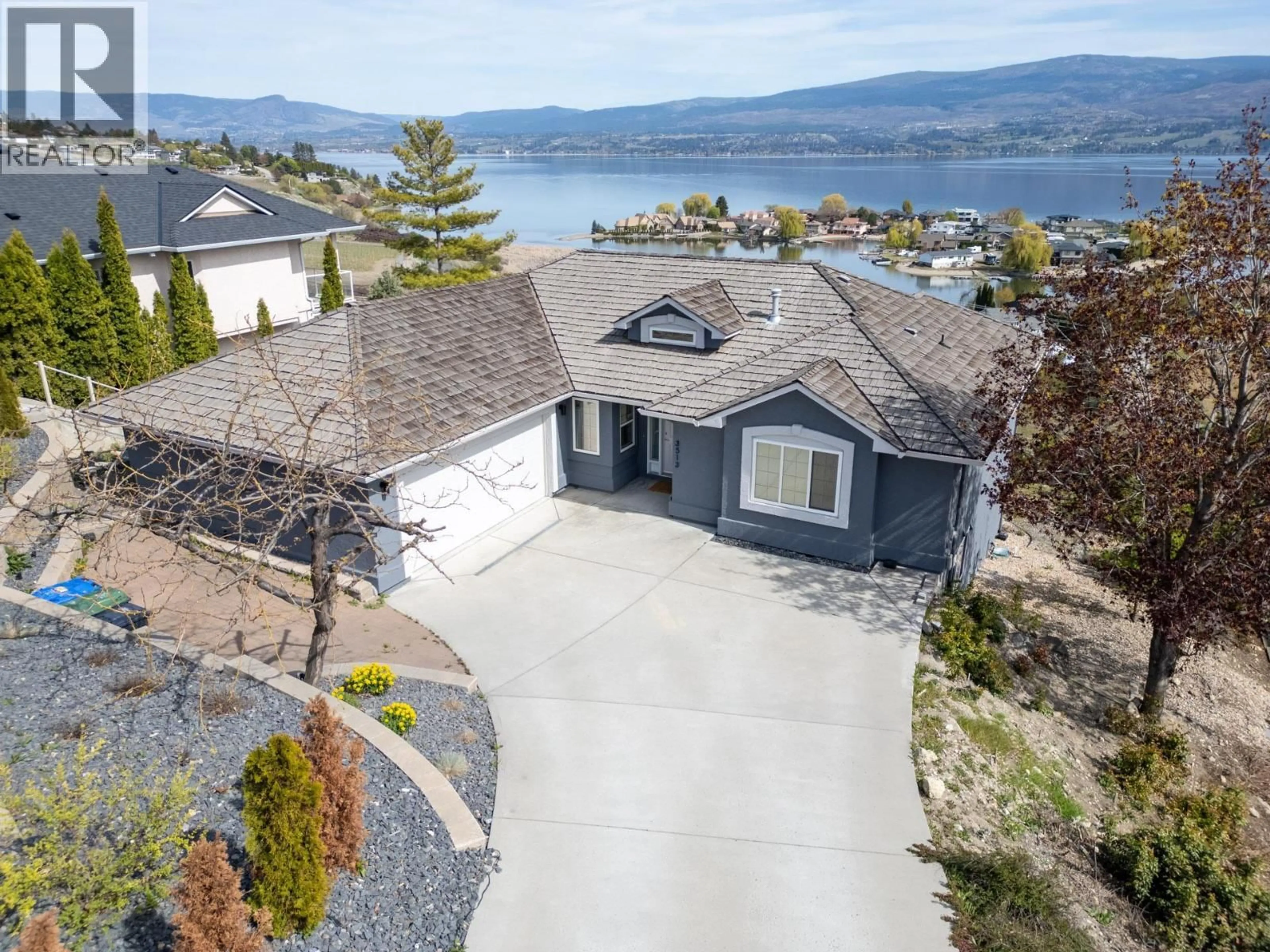 A pic from outside/outdoor area/front of a property/back of a property/a pic from drone, water/lake/river/ocean view for 3513 EMPIRE PLACE, West Kelowna British Columbia V4T1Y5