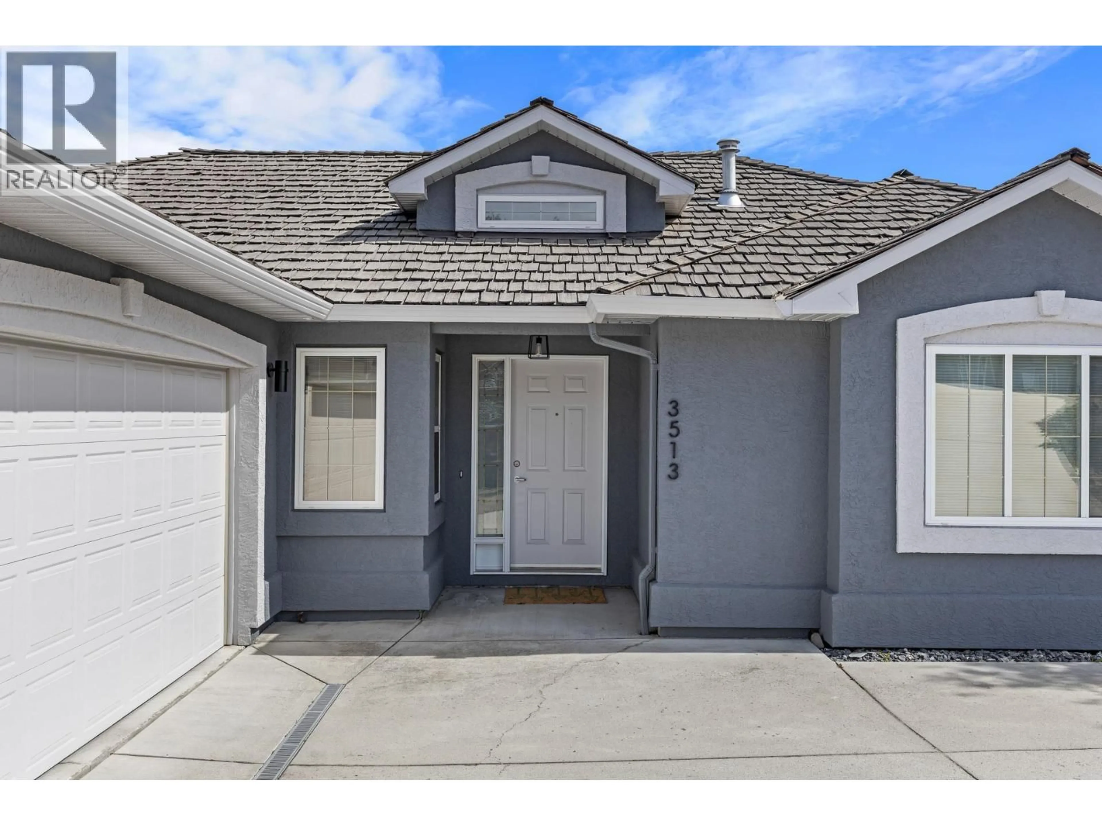 Home with vinyl exterior material, street for 3513 EMPIRE PLACE, West Kelowna British Columbia V4T1Y5