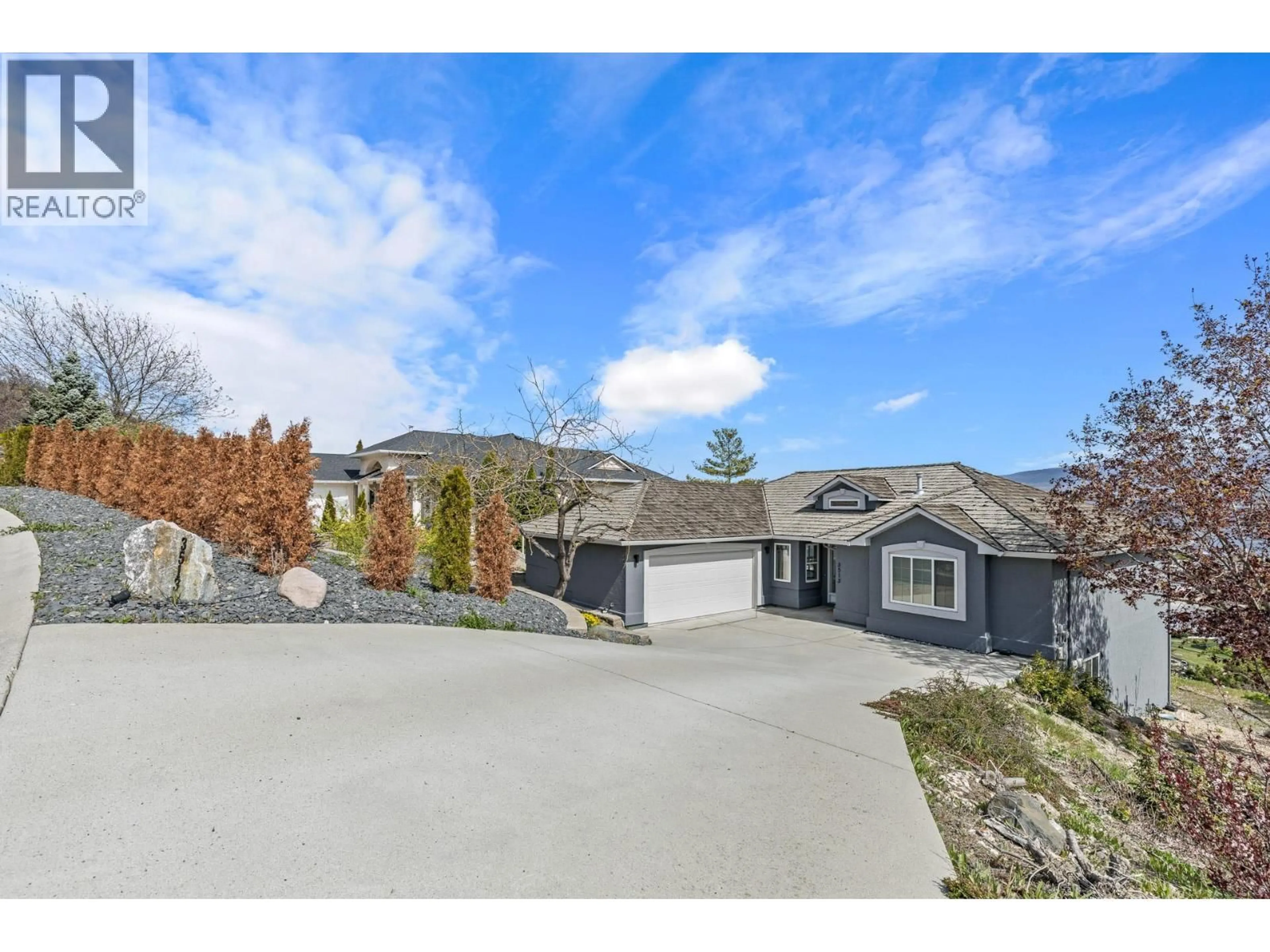 A pic from outside/outdoor area/front of a property/back of a property/a pic from drone, mountain view for 3513 EMPIRE PLACE, West Kelowna British Columbia V4T1Y5