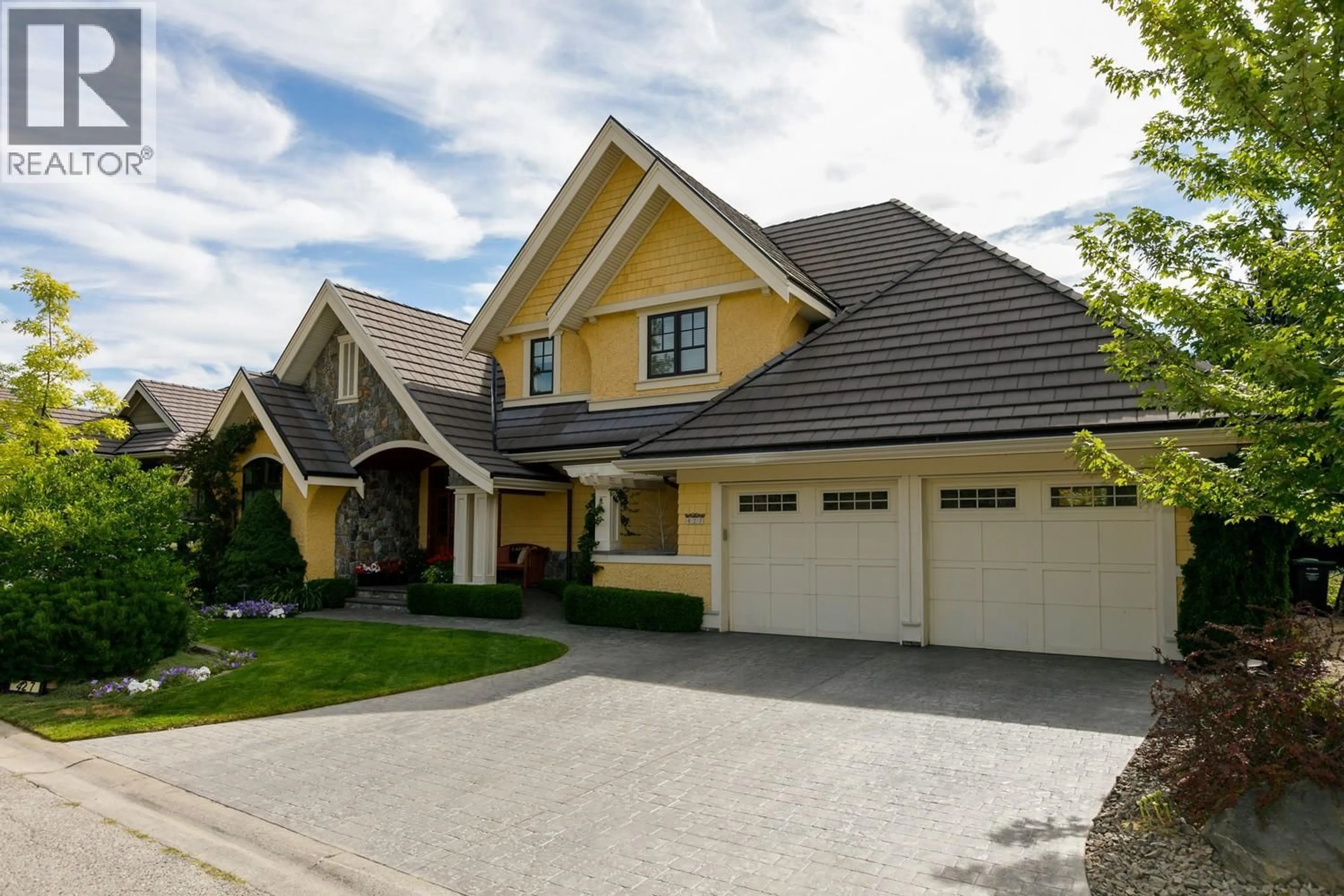 Home with vinyl exterior material, street for 427 LONG RIDGE DRIVE, Kelowna British Columbia V1V2R9