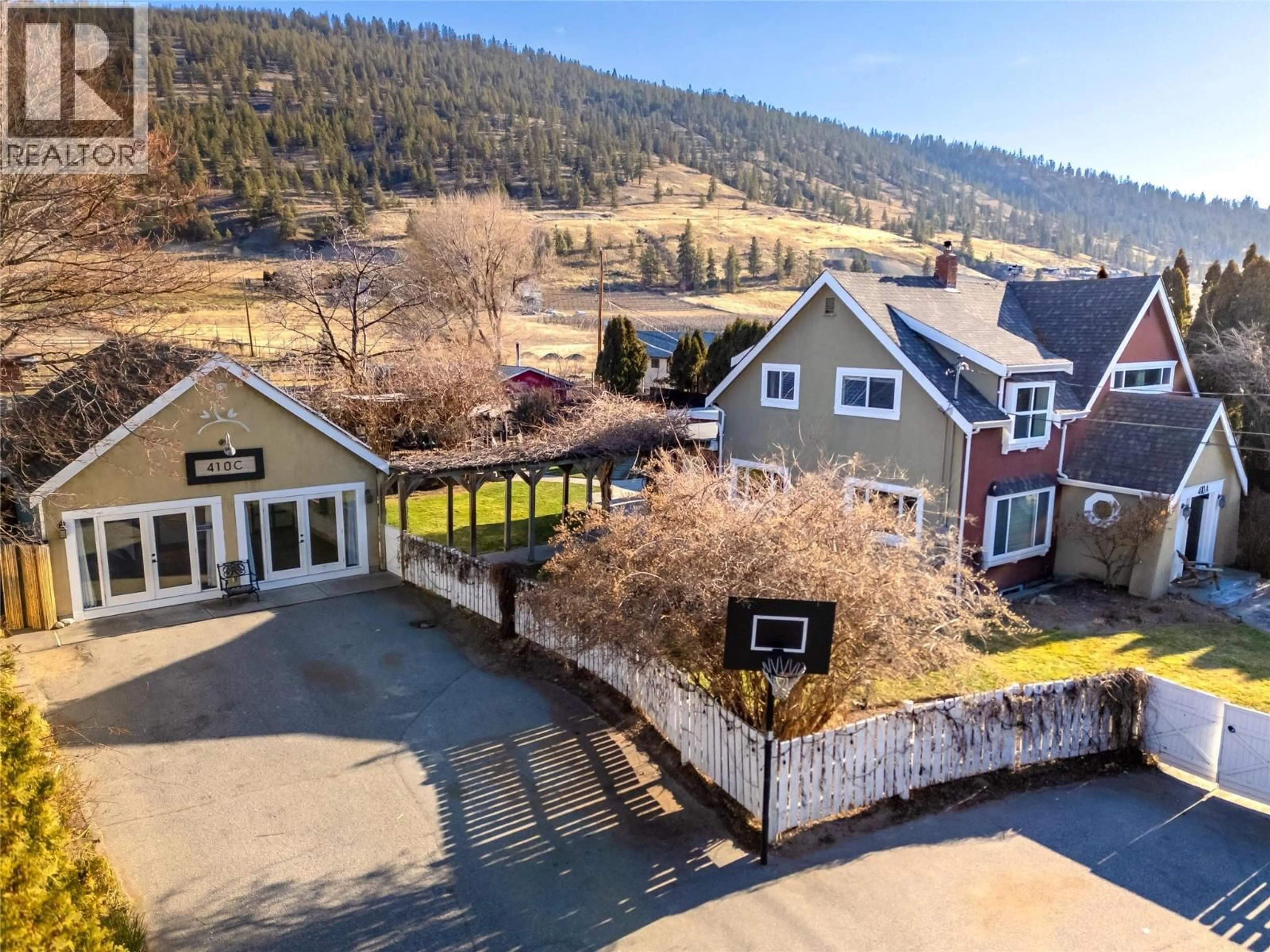 A pic from outside/outdoor area/front of a property/back of a property/a pic from drone, mountain view for 410 UPPER BENCH ROAD NORTH, Penticton British Columbia V2A8T4