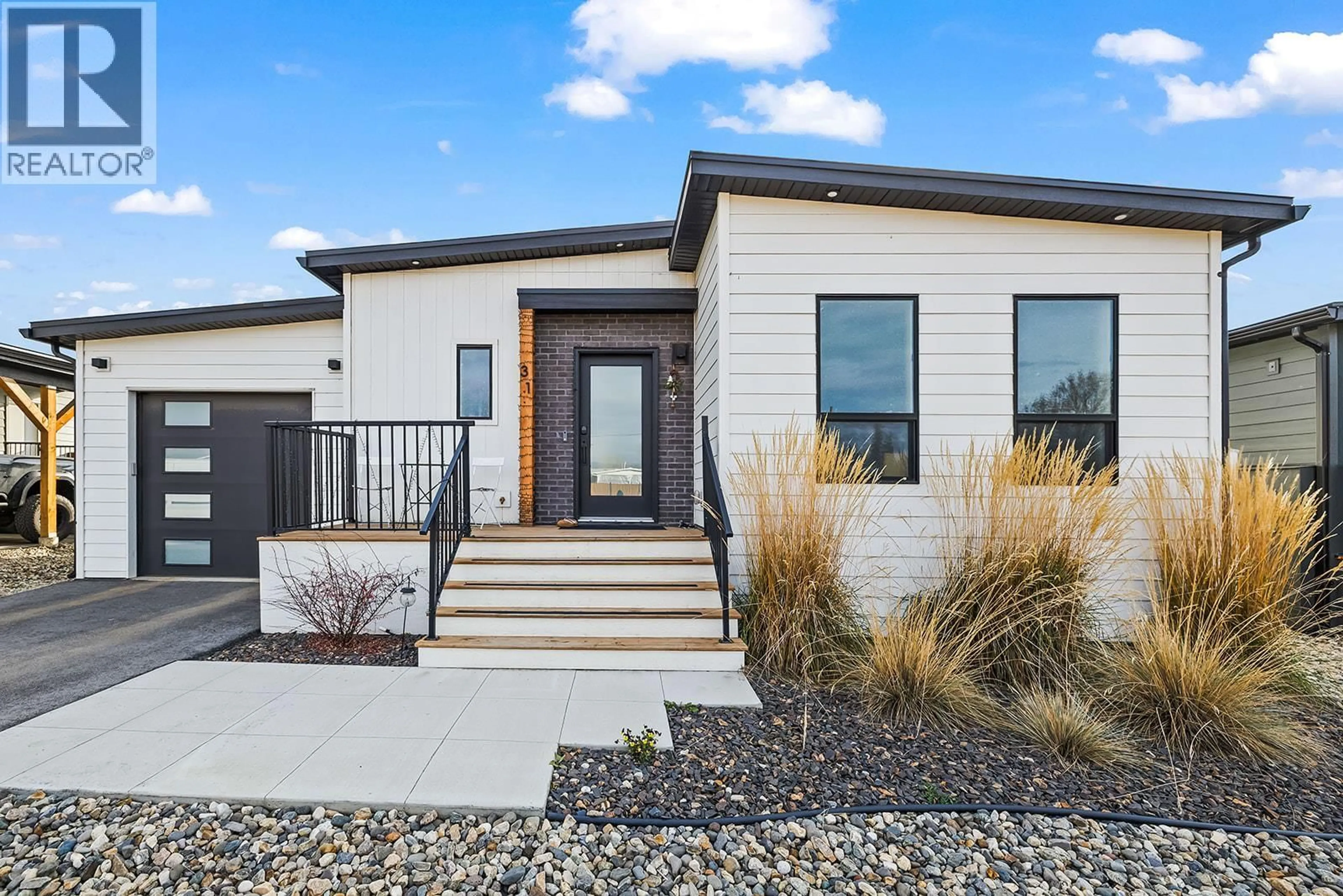 Home with vinyl exterior material, street for 31 - 8900 JIM BAILEY ROAD, Kelowna British Columbia V4V0B5