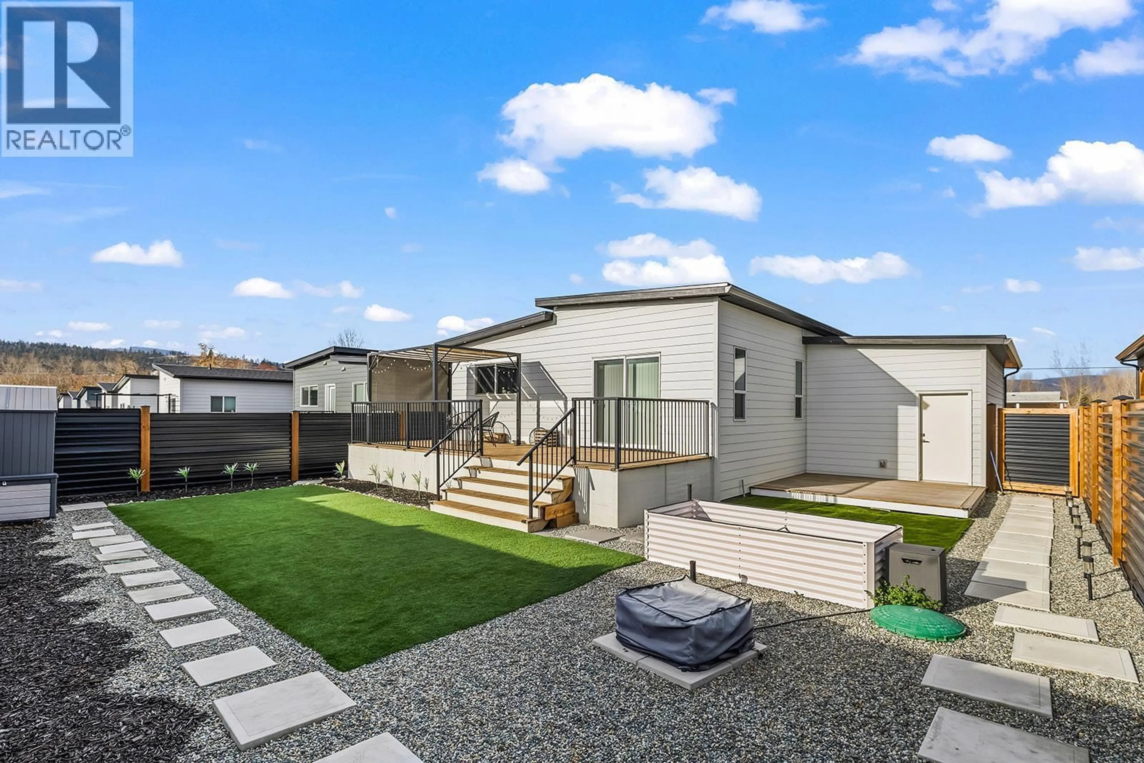 A pic from outside/outdoor area/front of a property/back of a property/a pic from drone, street for 31 - 8900 JIM BAILEY ROAD, Kelowna British Columbia V4V0B5